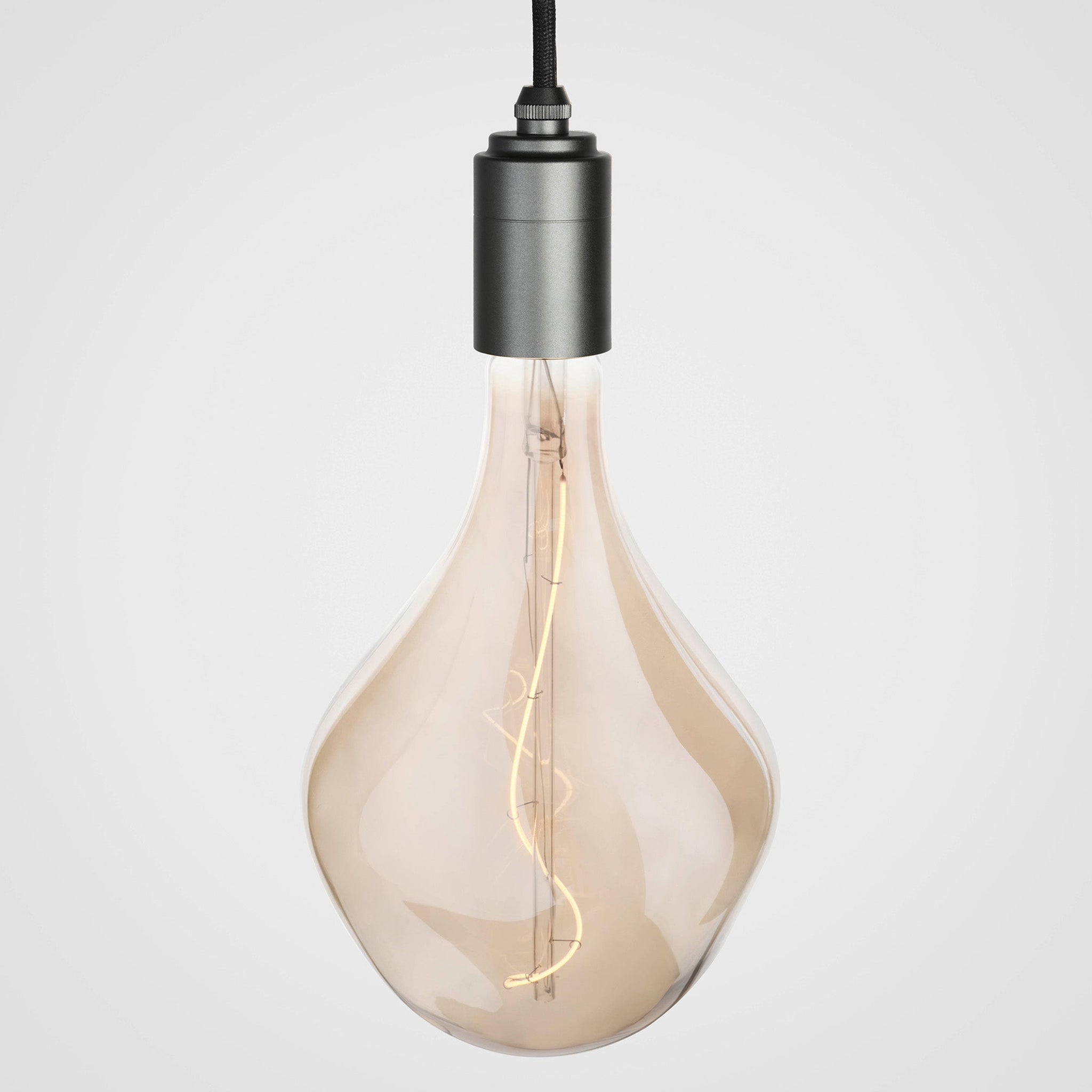 Voronoi II bulb in Graphite pendant, lit, grey background