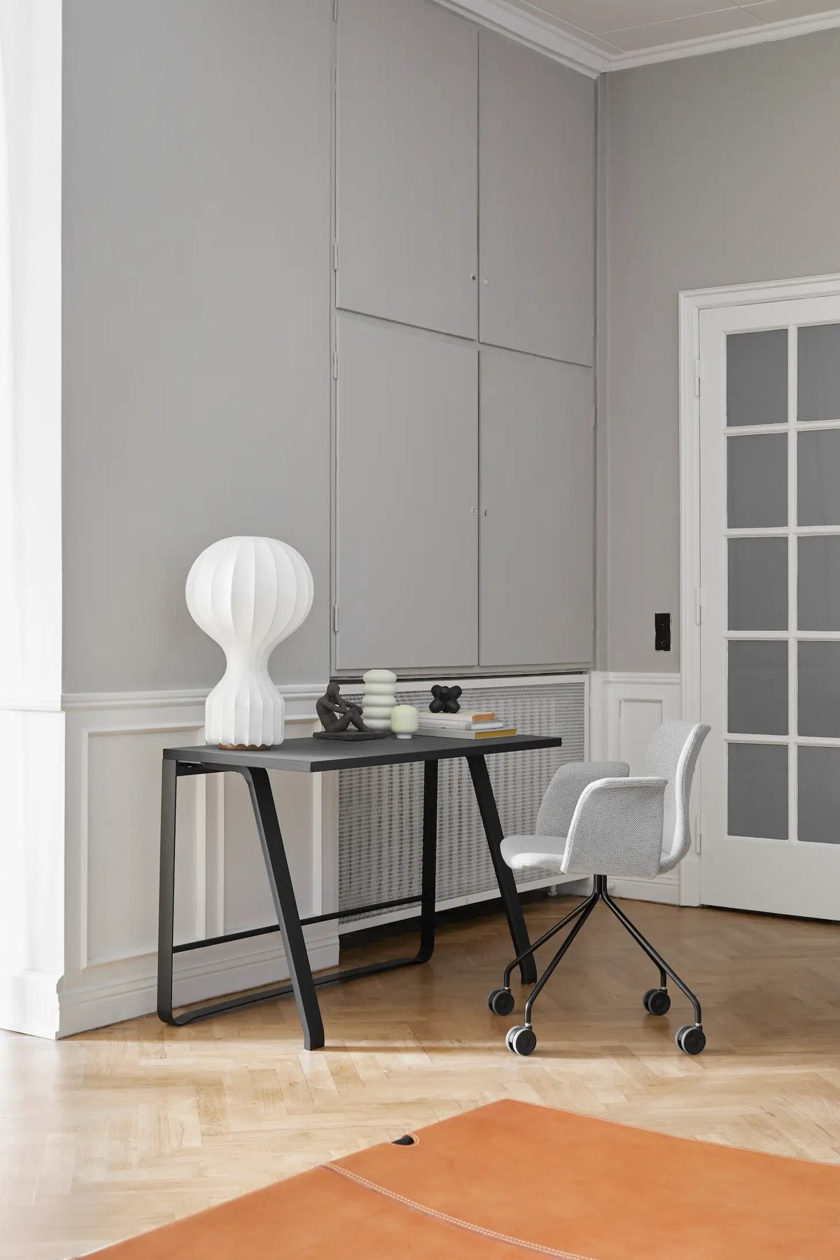 Bent Hansen Hemingway Desk in black linoleum, black legs, styled in an interior setting, beech and steel
