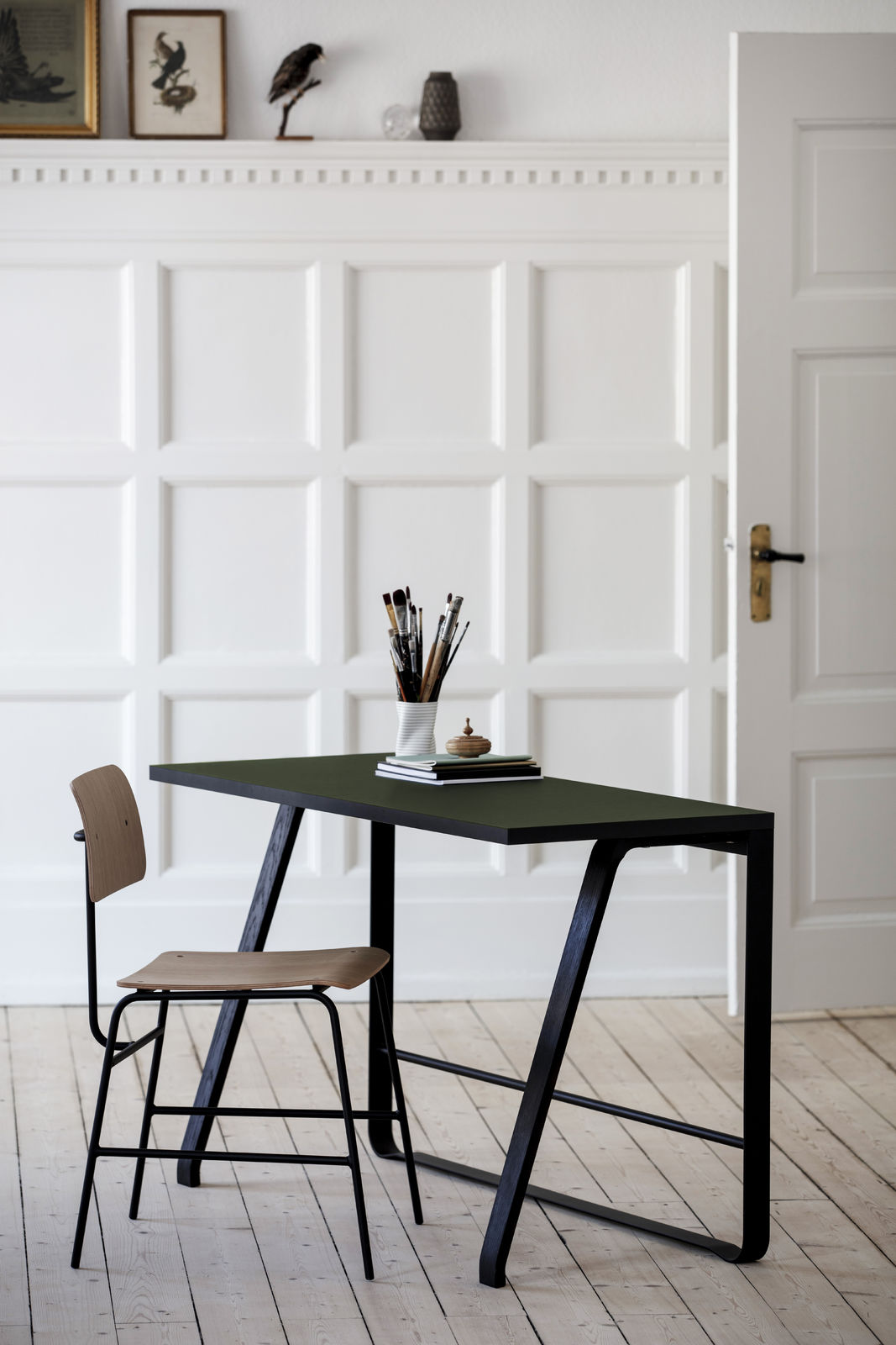 Bent Hansen Hemingway Desk in black linoleum, black legs, styled in an interior setting, beech and steel