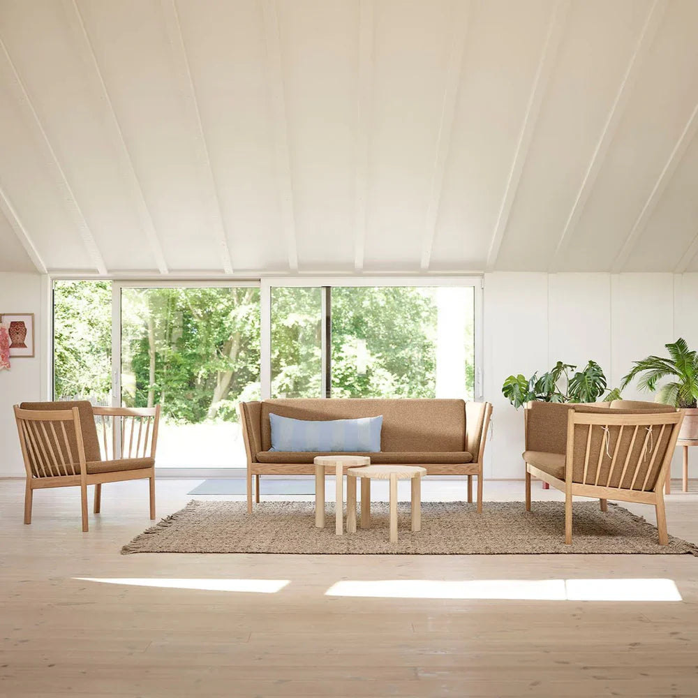 FDB Møbler Armchair in solid oak (brown), designed by Ole Jørgensen