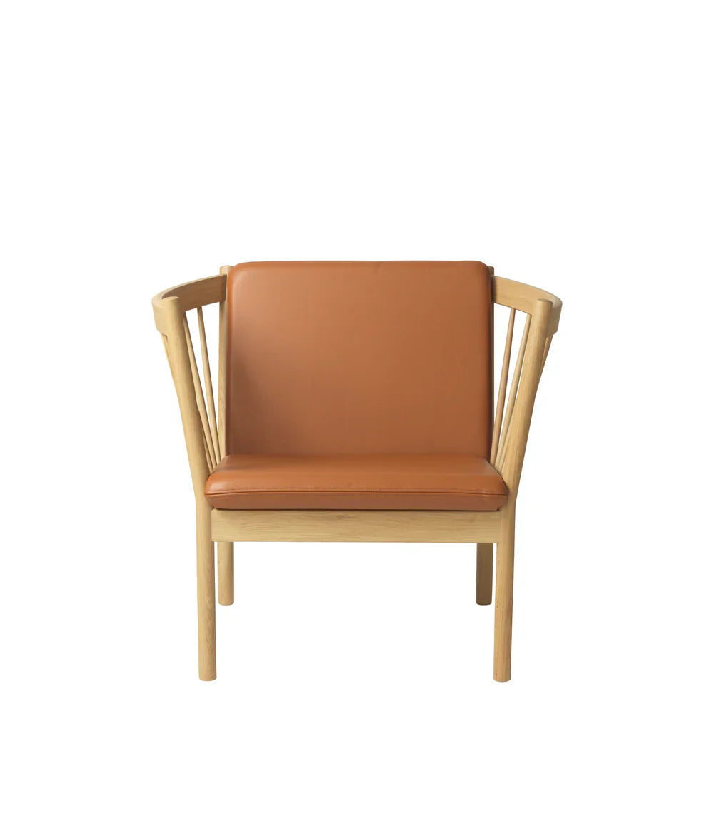FDB Møbler Armchair in solid oak (cognac), designed by Ole Jørgensen