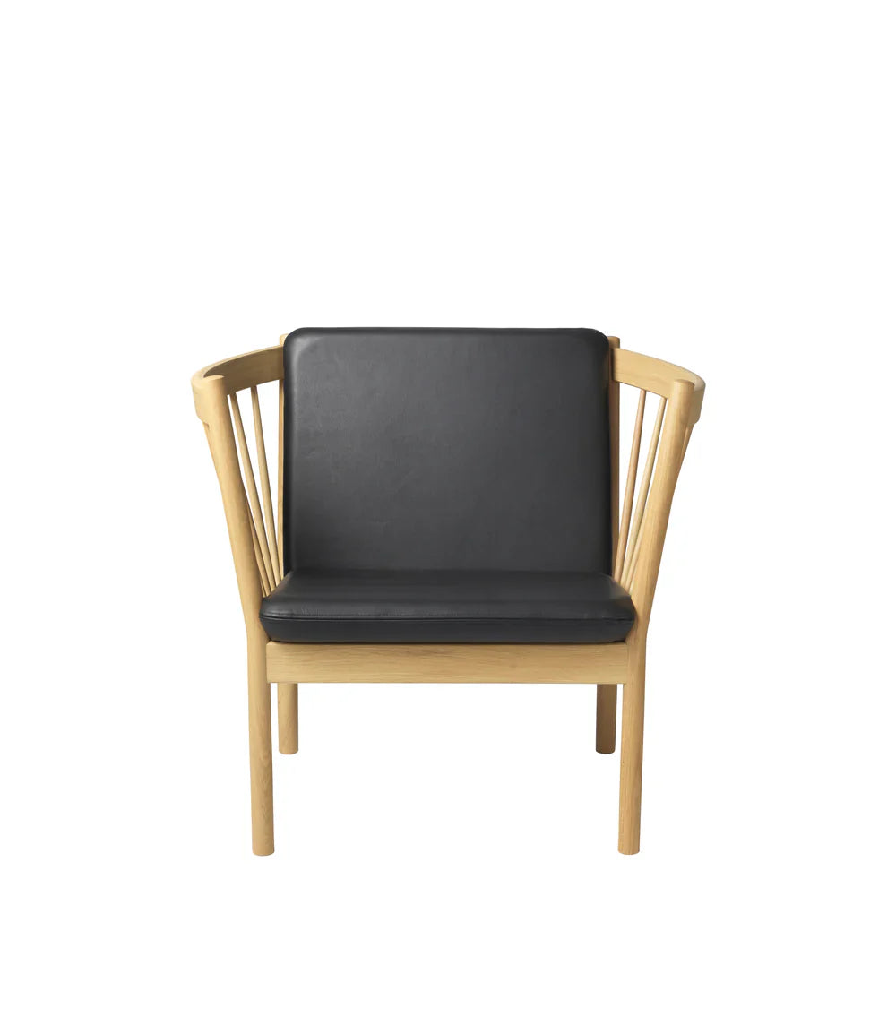 FDB Møbler Armchair in black-stained solid oak, designed by Ole Jørgensen