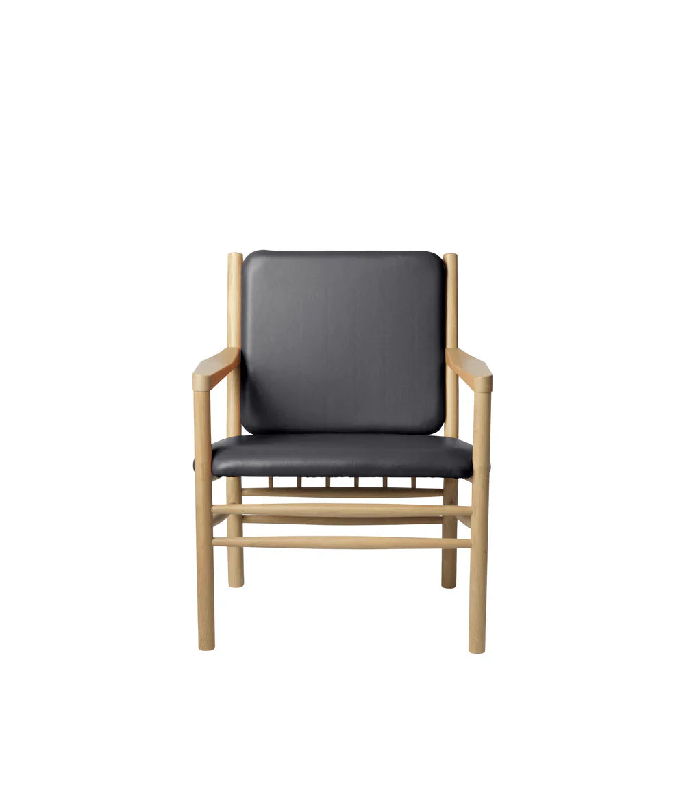 FDB Møbler Armchair in black-stained solid oak, designed by Ole Jørgensen