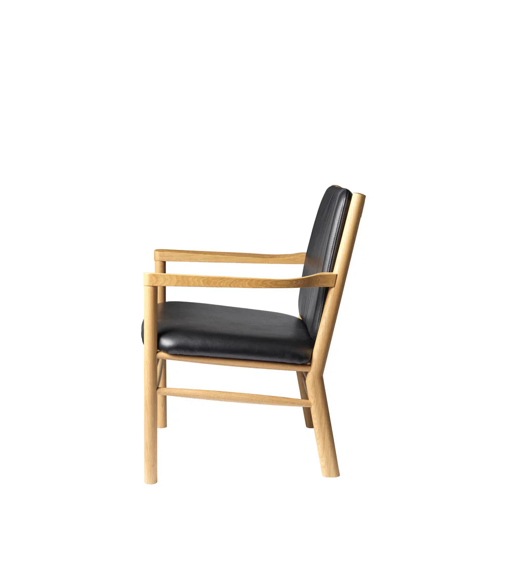 FDB Møbler Armchair in black-stained solid oak, designed by Ole Jørgensen
