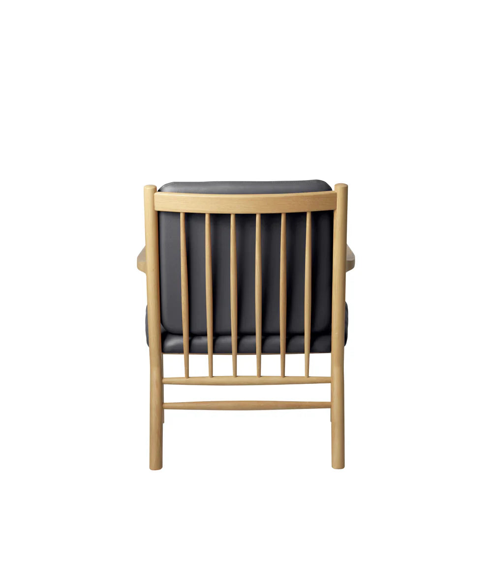FDB Møbler Armchair in black-stained solid oak, designed by Ole Jørgensen