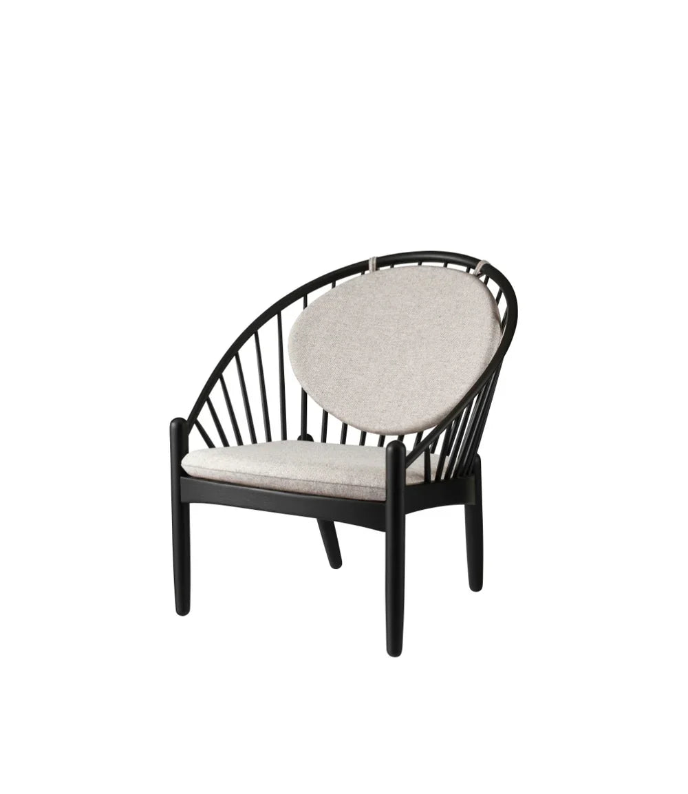FDB Møbler Jørna Chair in jet black (light grey), designed by Poul M. Volther