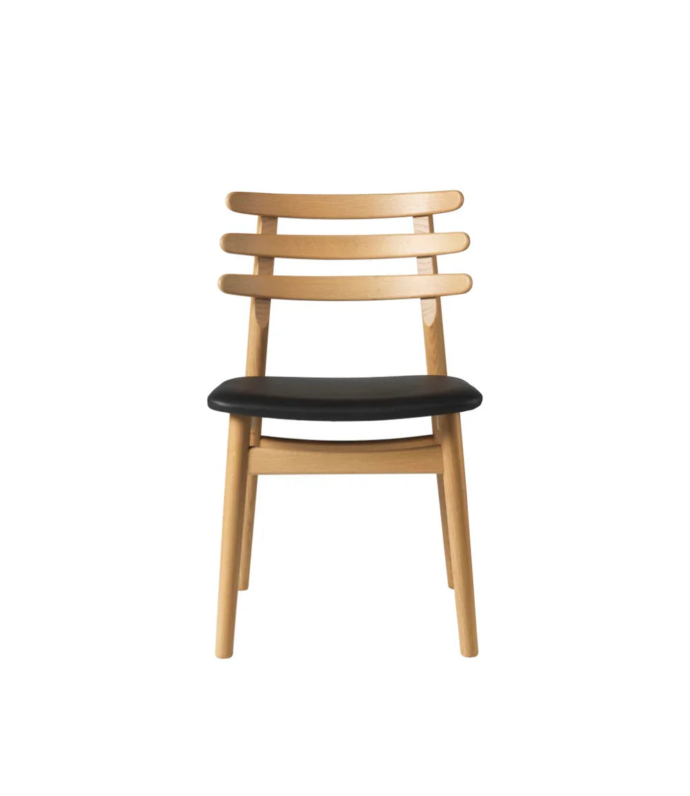FDB Møbler Chair in oiled solid oak (black), designed by Poul M. Volther