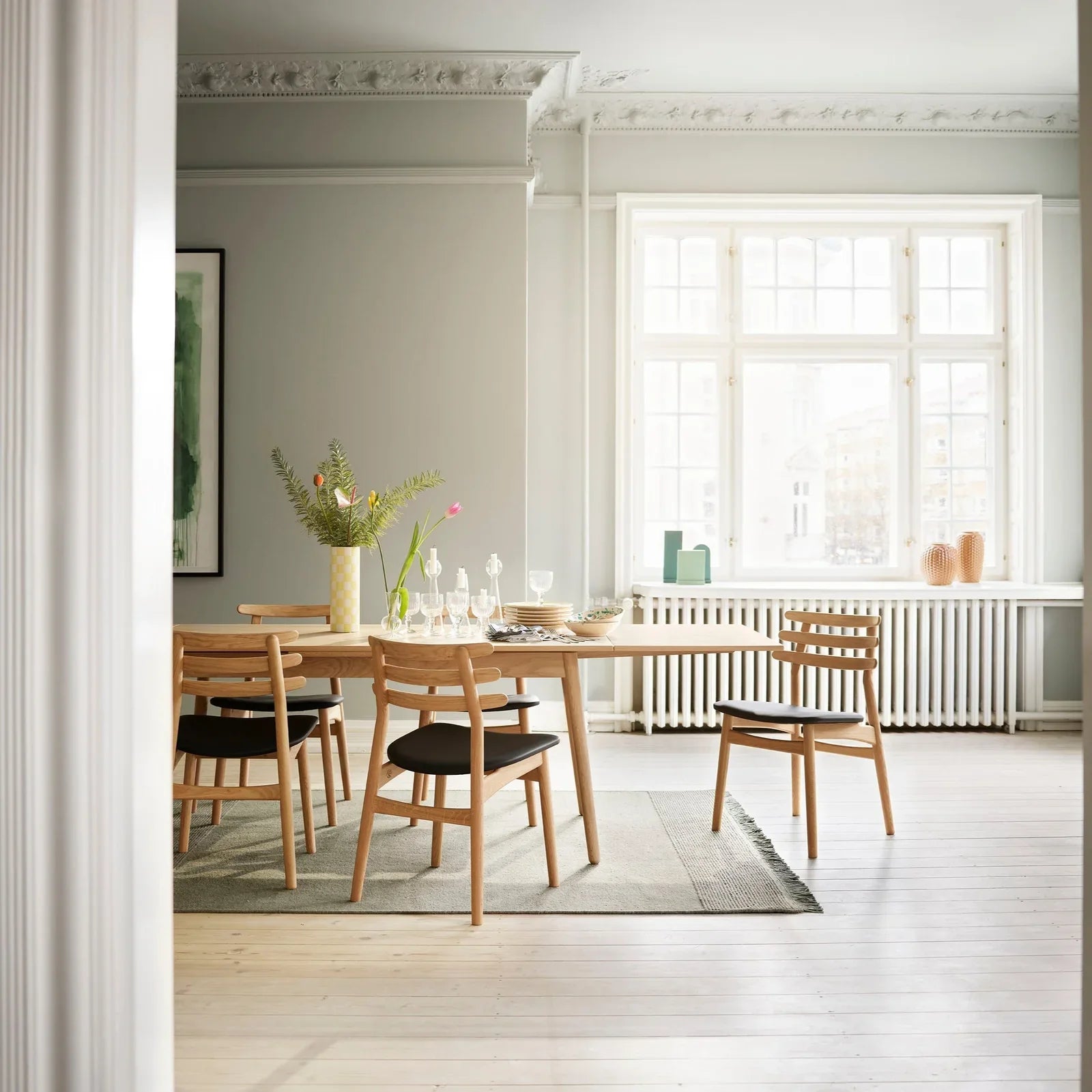 FDB Møbler - Chair in black-stained solid oak (black leather black), designed by Poul M. Volther