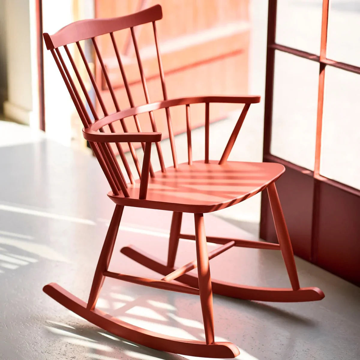 FDB Møbler Rocking chair in solid beech (brick red), designed by Børge Mogensen