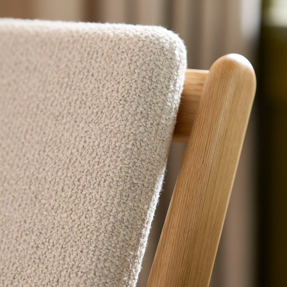 FDB Møbler Armchair in solid oak (beige), designed by Poul M. Volther