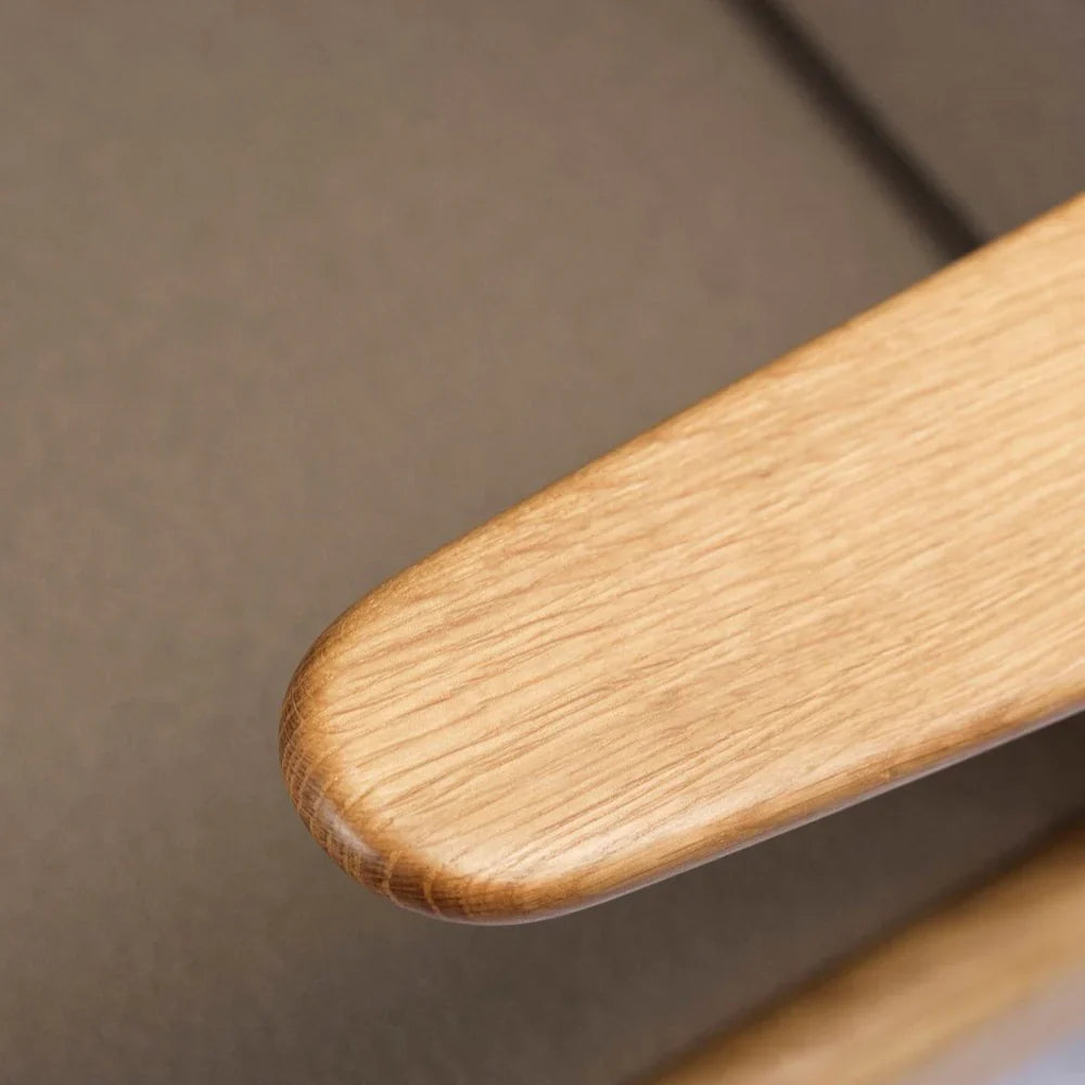 FDB Møbler Armchair in solid oak (taupe), designed by Poul M. Volther