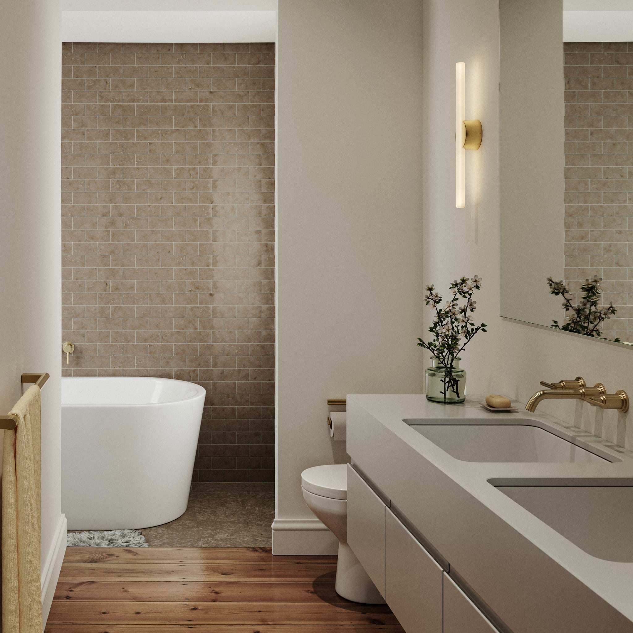 Kilter 1.0 Wall Light in Solid Brass, small size, 2700K bathroom lifestyle