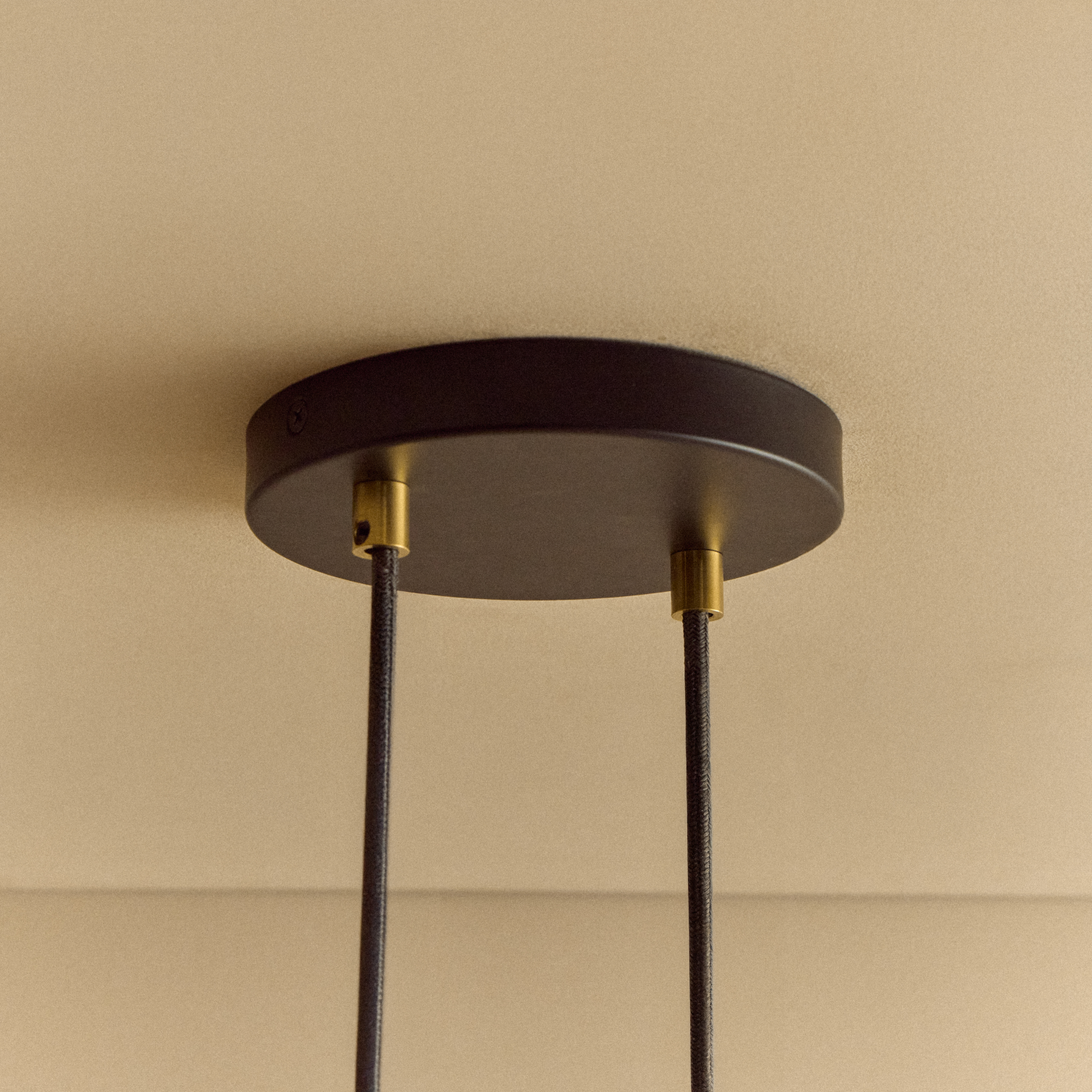 Kilter Pendant Light, off-axis balanced brass form