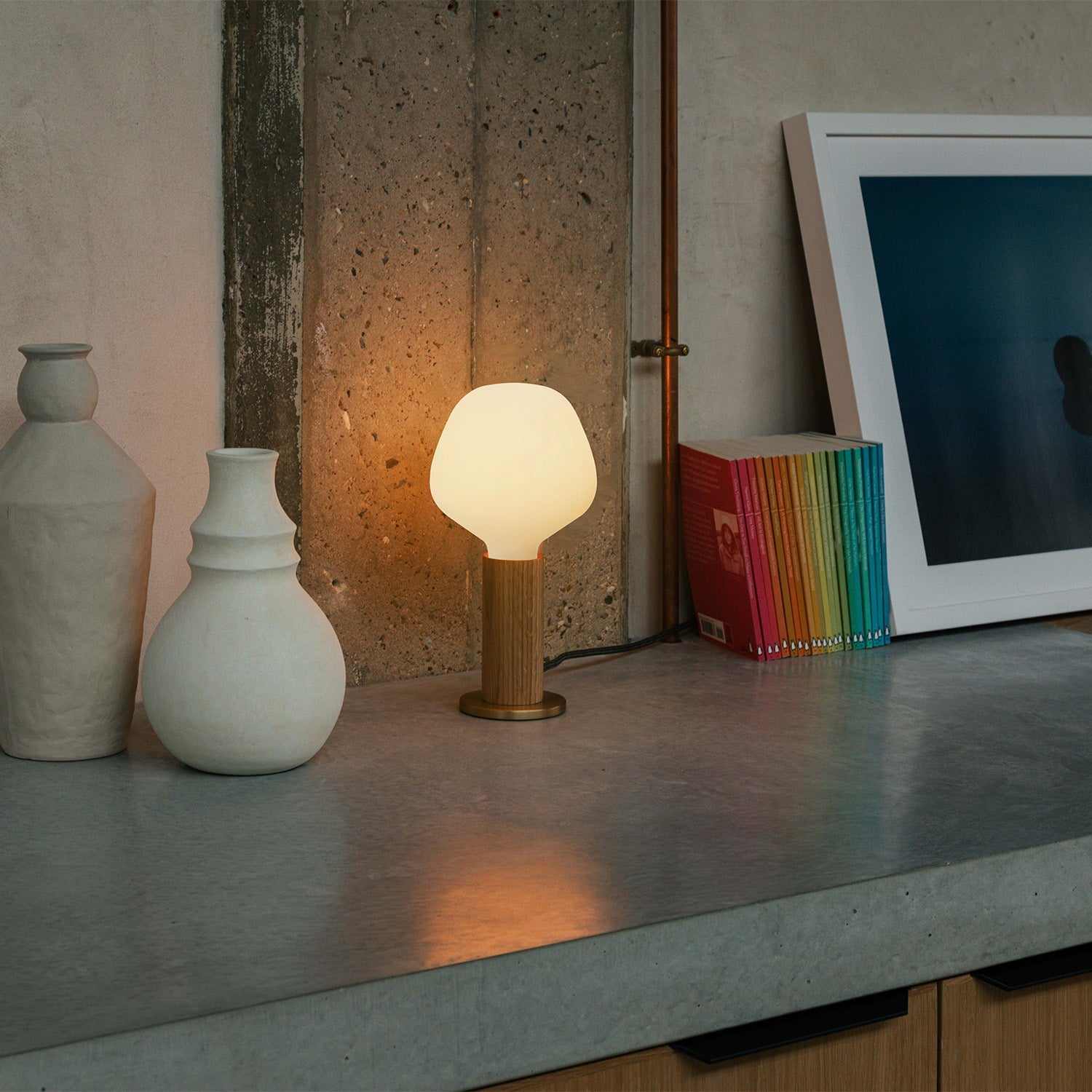 Knuckle Table Lamp in Oak with Enno bulb, lifestyle setting