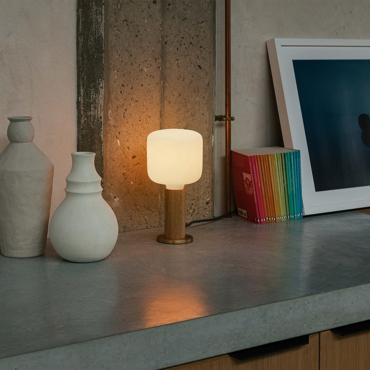Knuckle Table Lamp in Oak with Oblo bulb, living room lifestyle