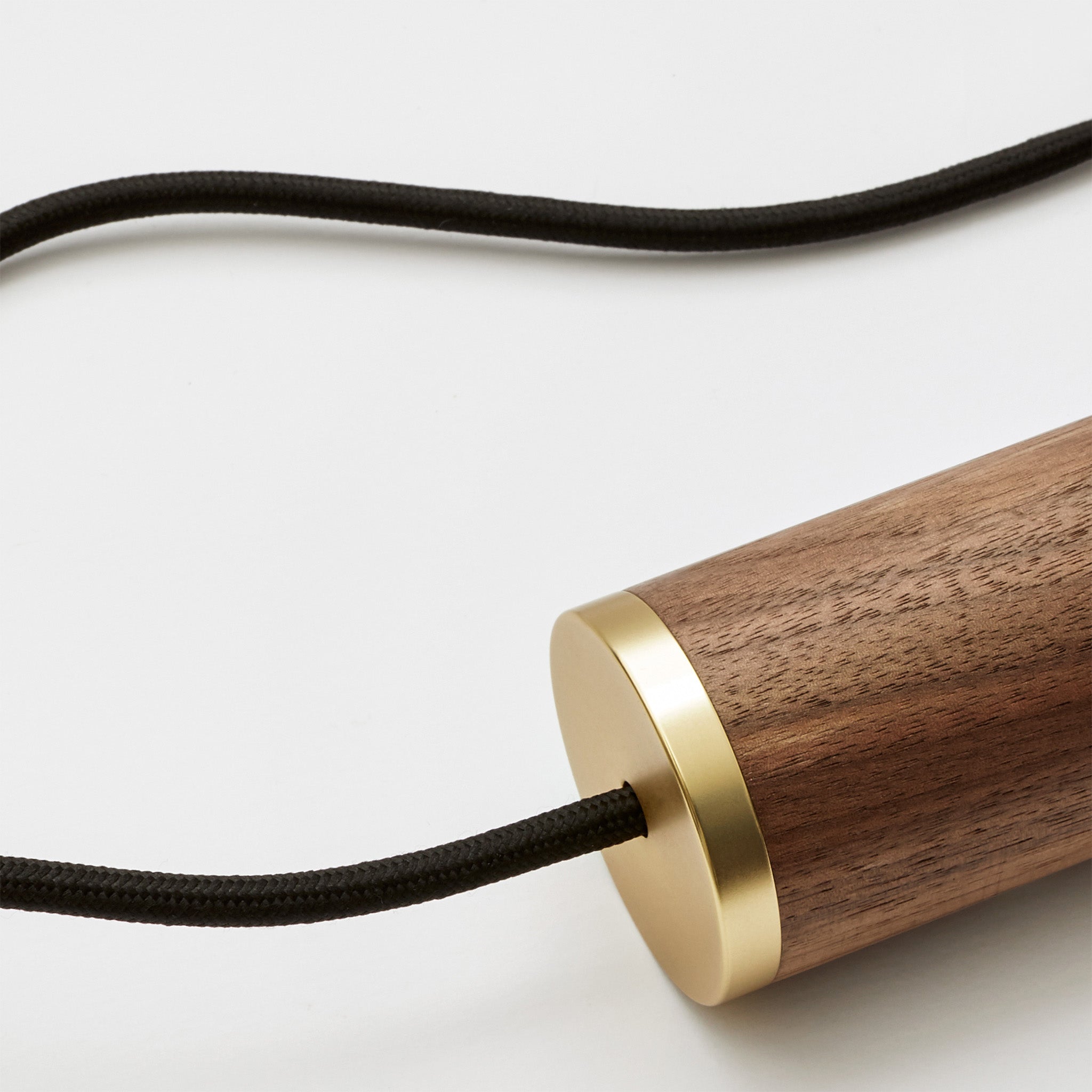 Noma Pendant Light in Walnut by Tala — angled side view