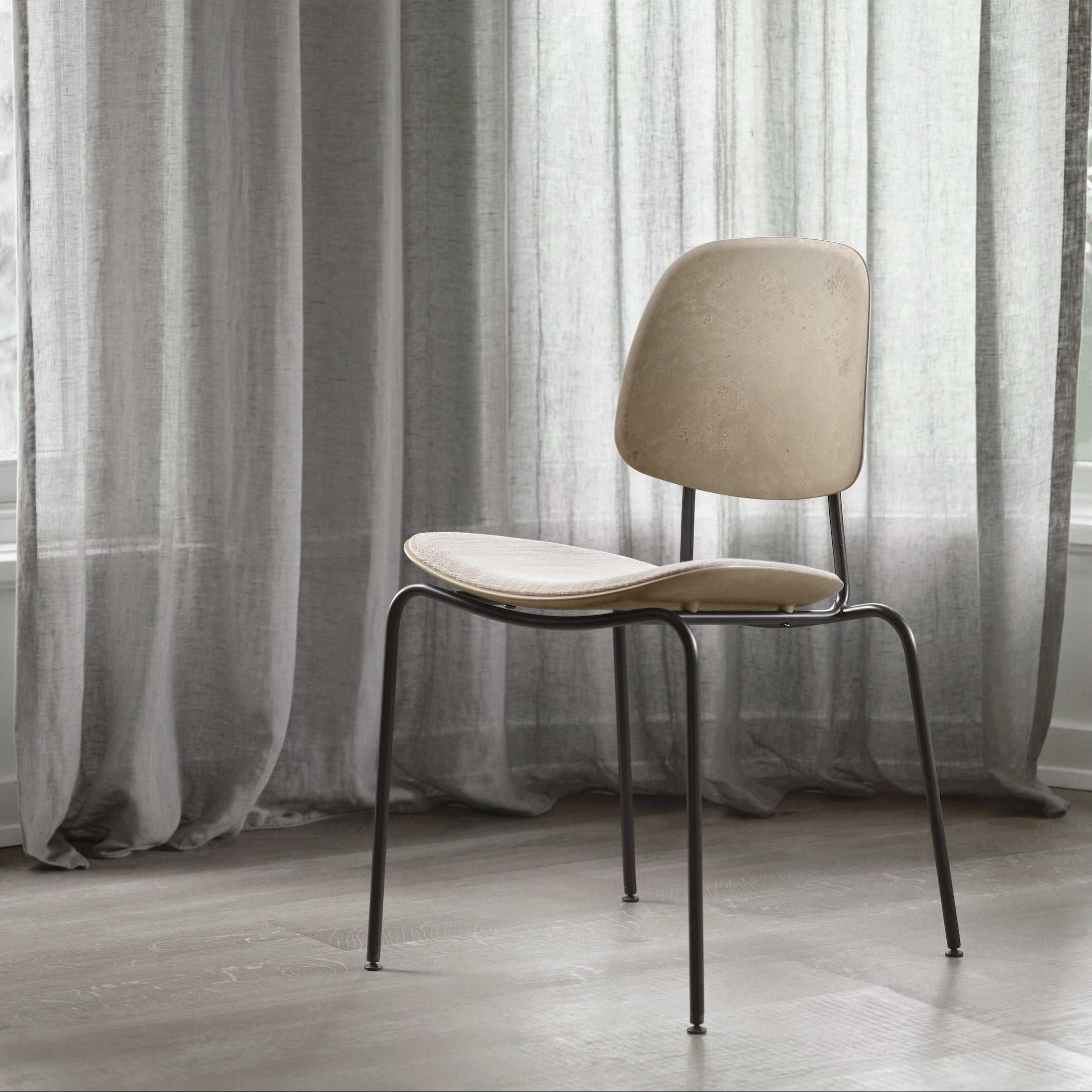 Mater Compound Dining Chair in solid wood styled in a dining room