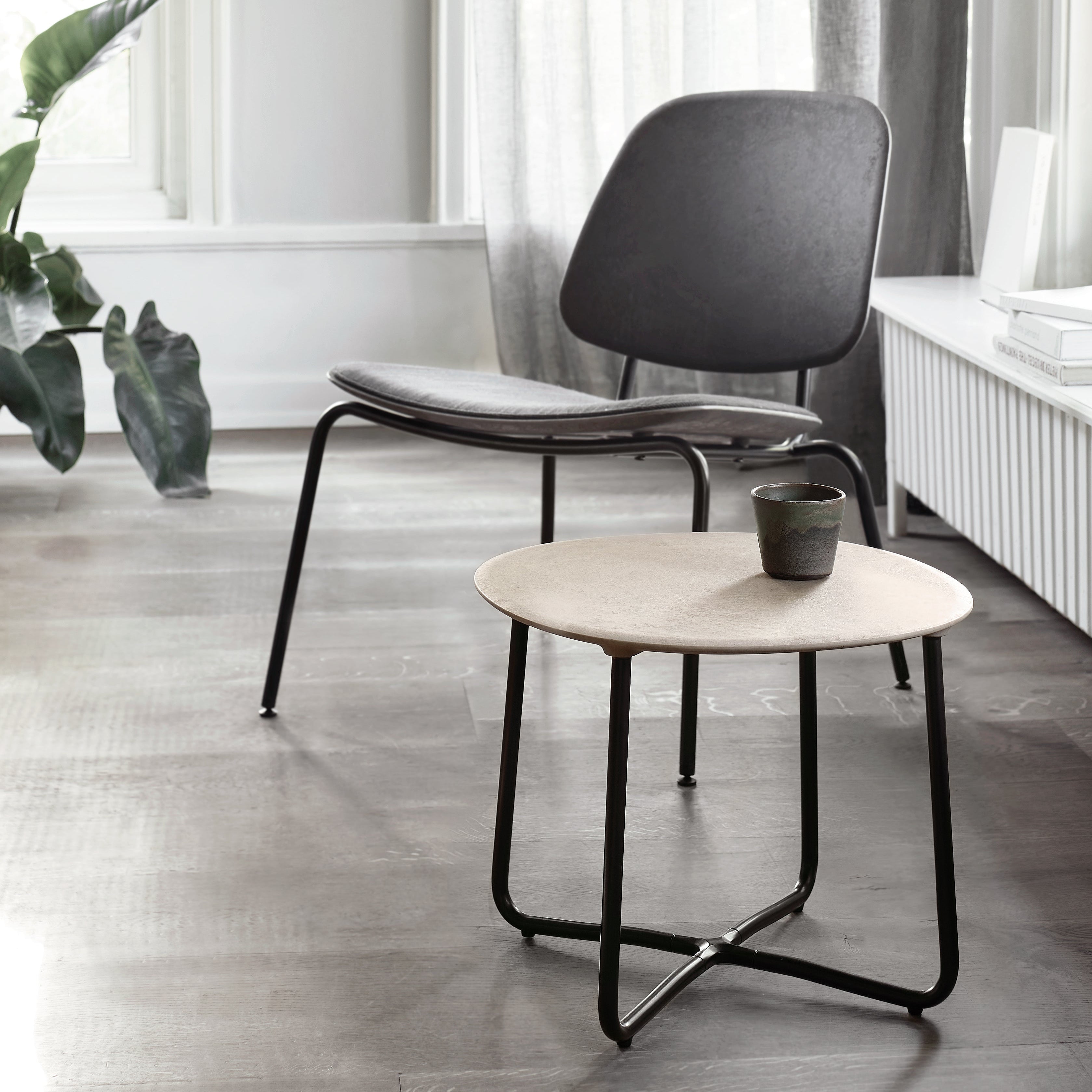 Mater Lily Side Table in solid wood styled in an interior setting