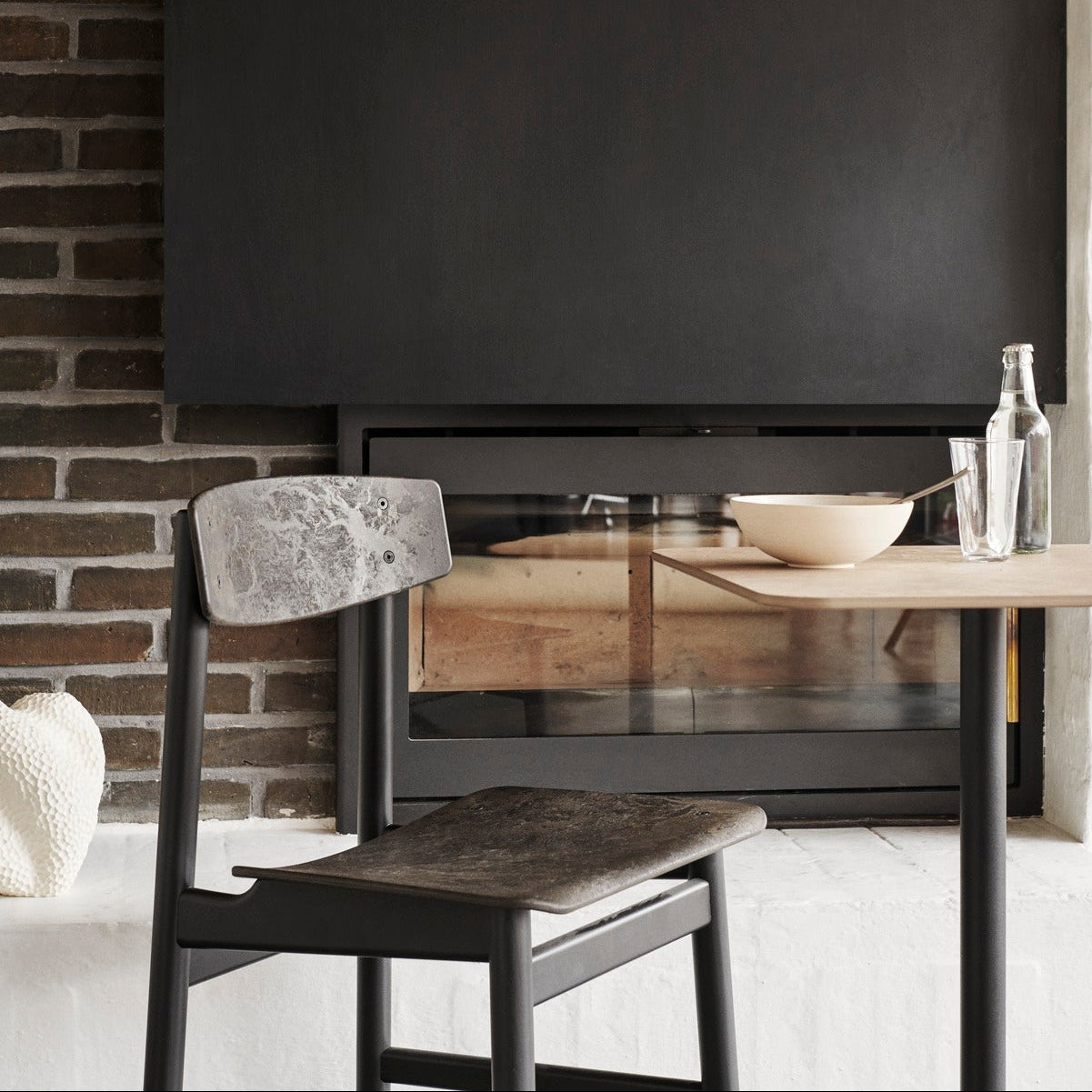 Mater Conscious Chair in solid wood, designed by Jorgen Moller, styled in an interior setting