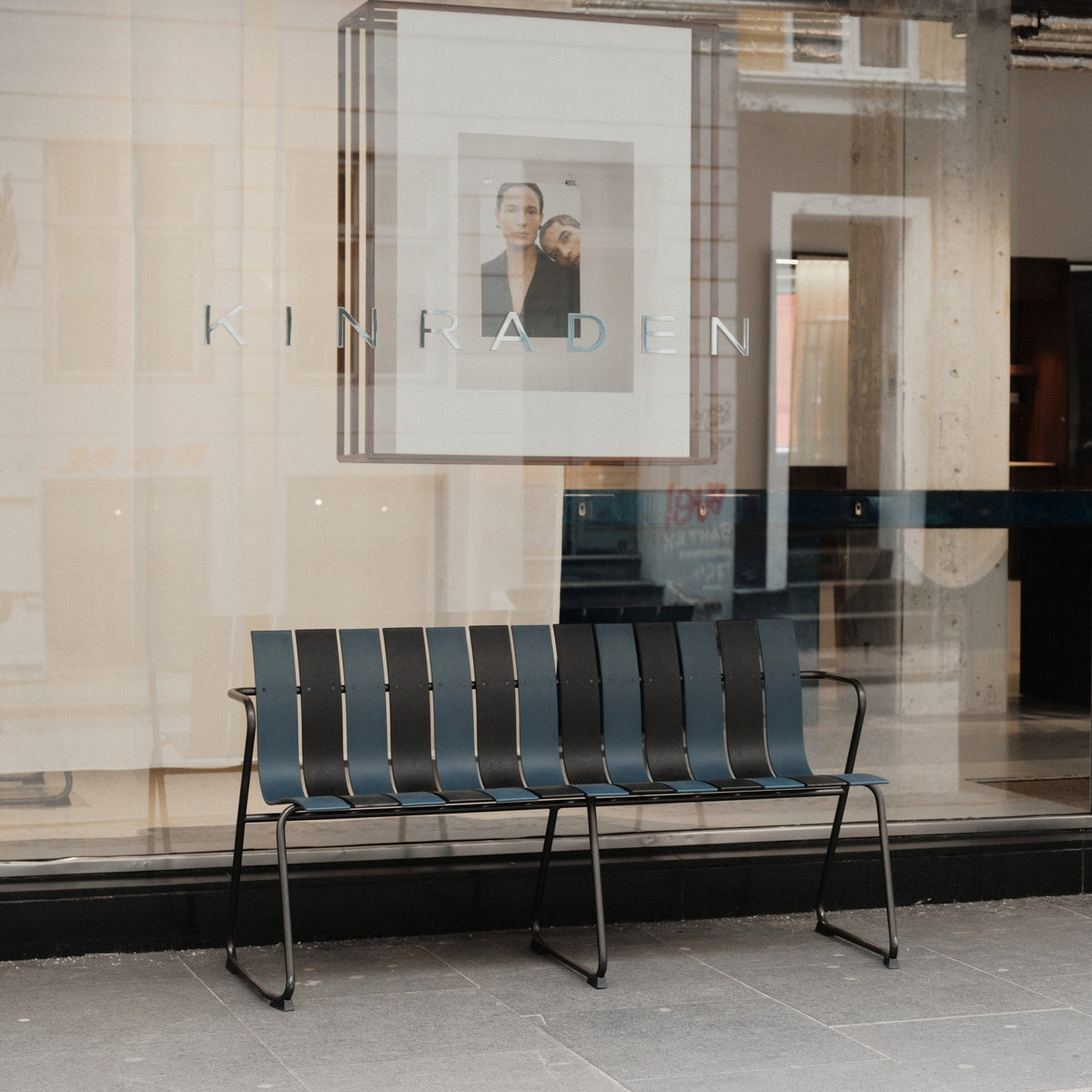 Mater Ocean Bench styled in an outdoor setting, slats of recycled plastic waste