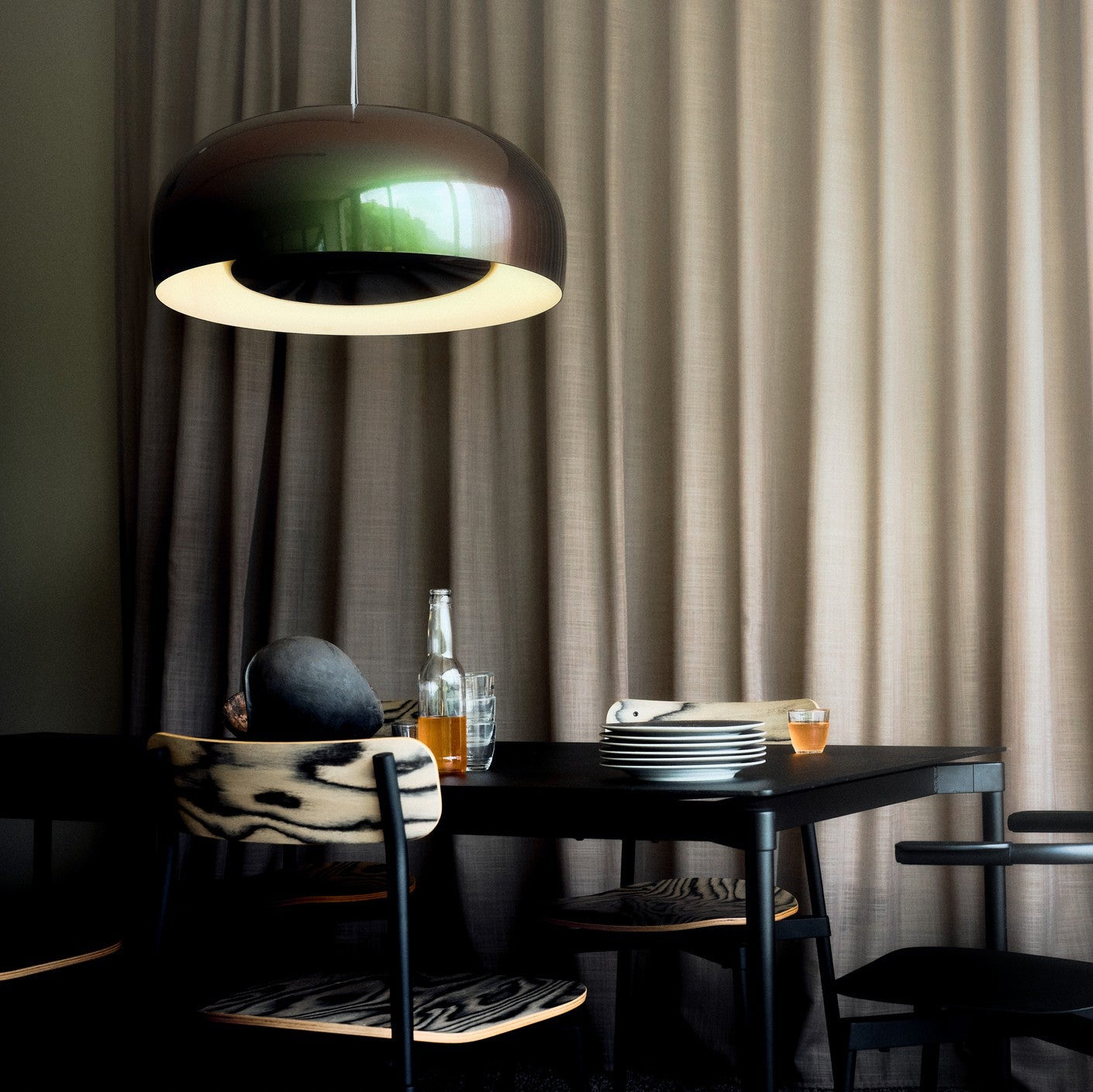 Petite Friture Brush Pendant Light styled in a designer interior