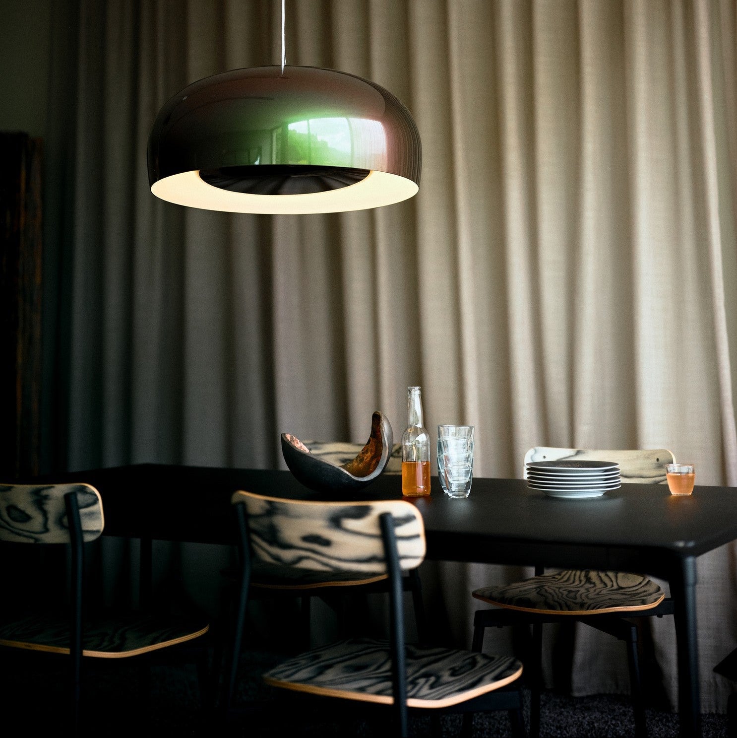 Petite Friture Brush Pendant Light styled in a designer interior