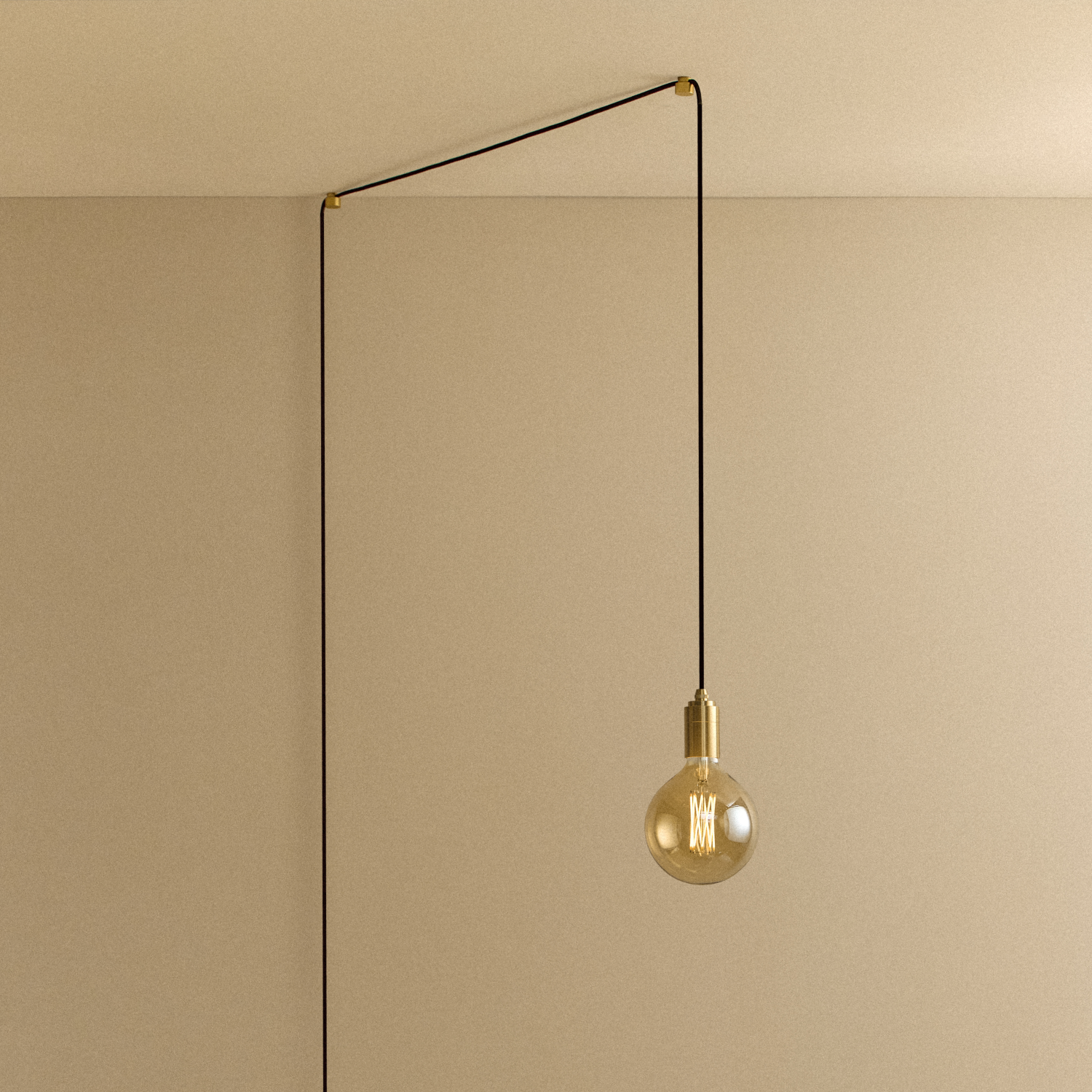 Gaia Plug-In Pendant in Brass, front view with fabric cord and amber-glow bulb