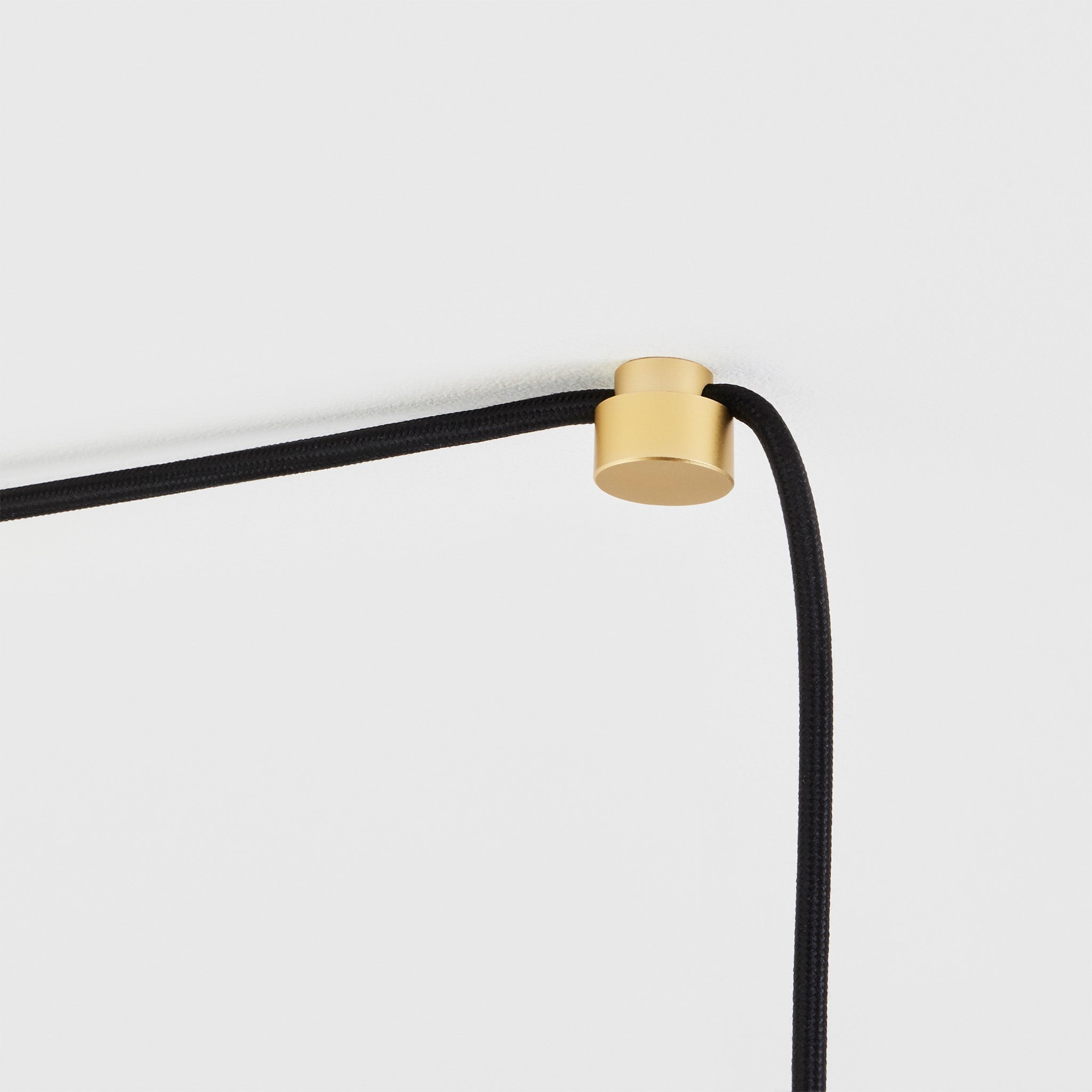 Alternate angle of the Gaia Plug-In Pendant in Brass by Tala