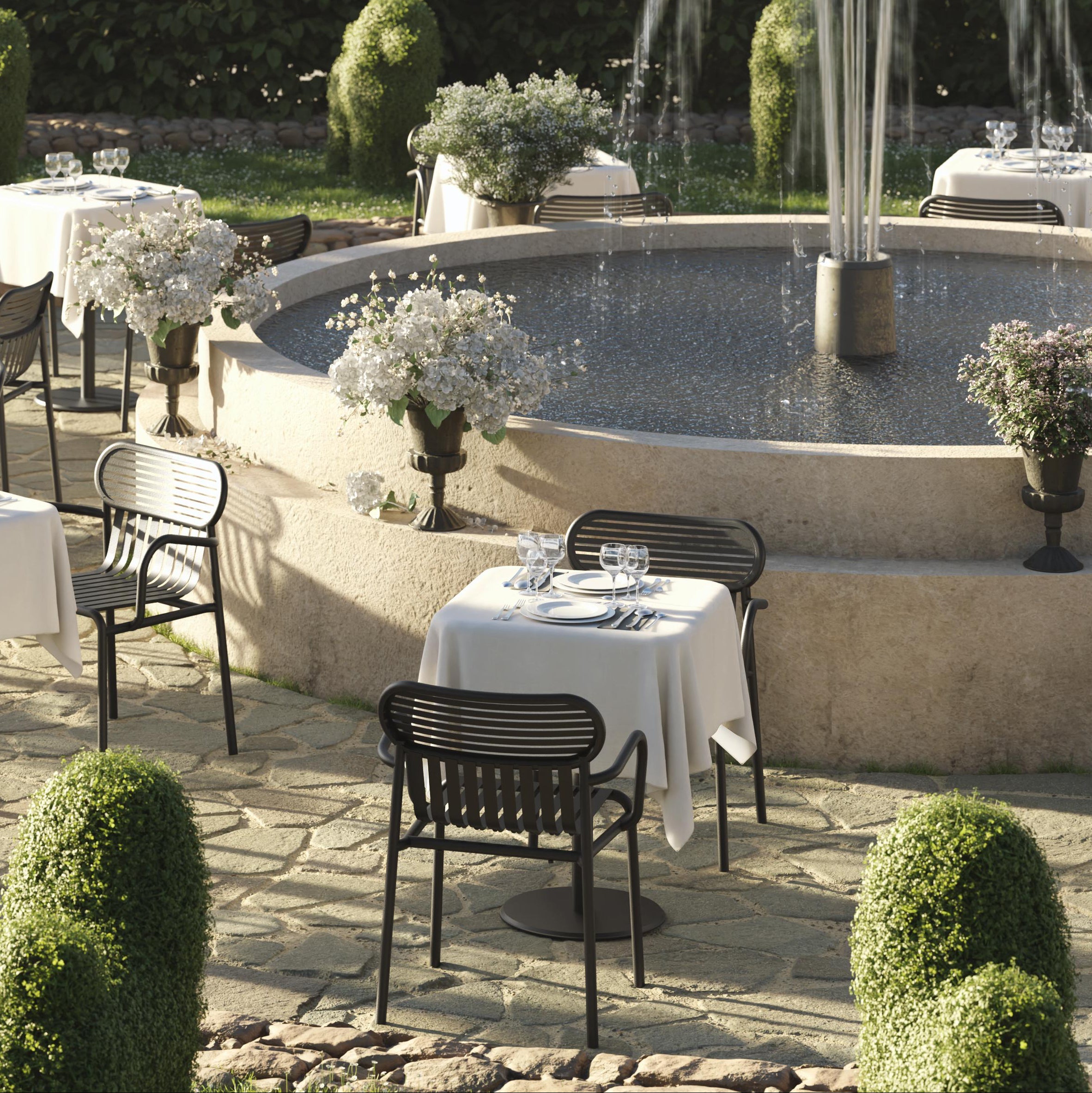 Petite Friture Week-End Bridge Armchair styled in a dining setting, designed by Pauline Deltour