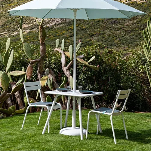 Fermob Luxembourg Side Chair styled in a Mediterranean setting, the Luxembourg garden chair
