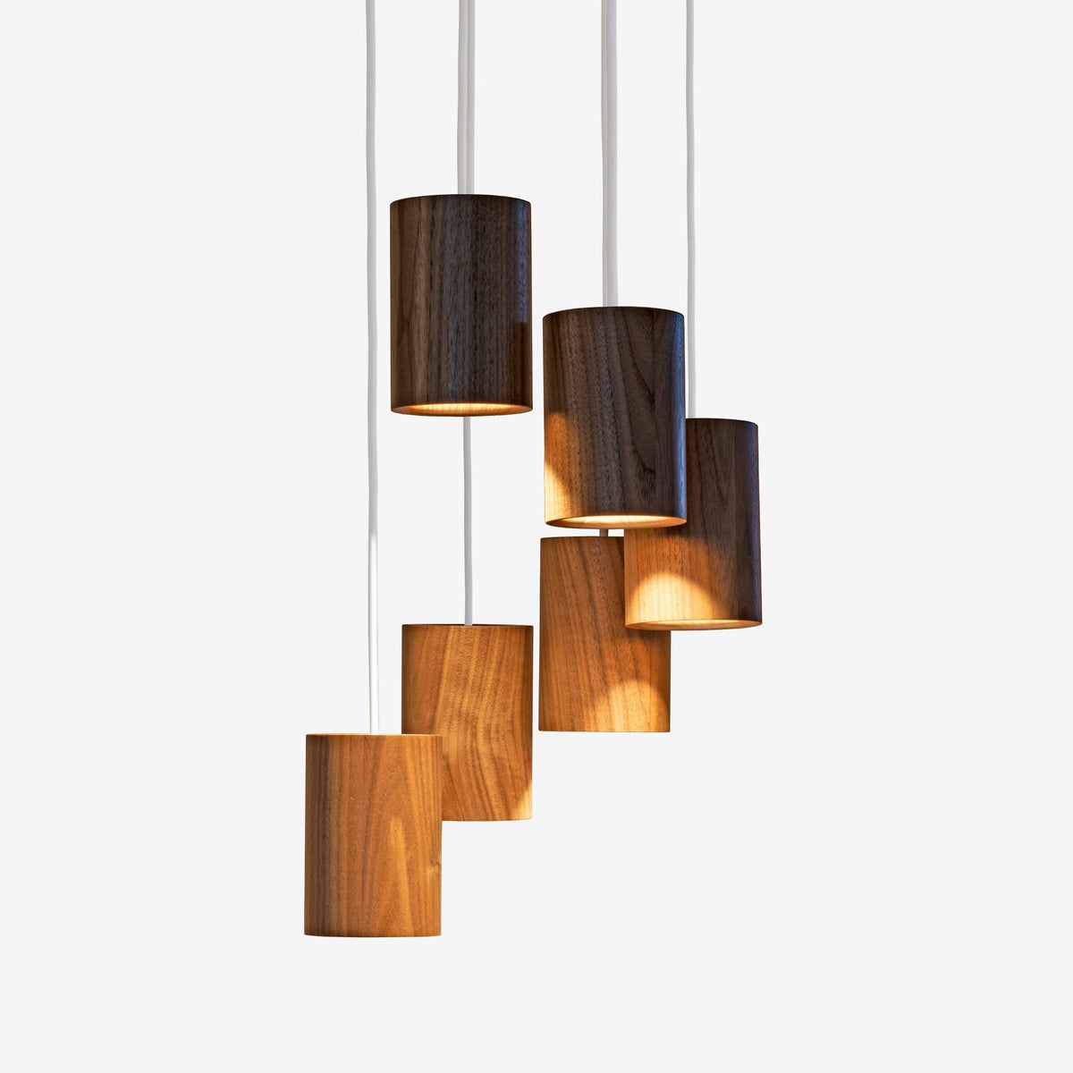 Case Solid Six Pendant Cluster in Walnut, staggered cylinders, solid walnut