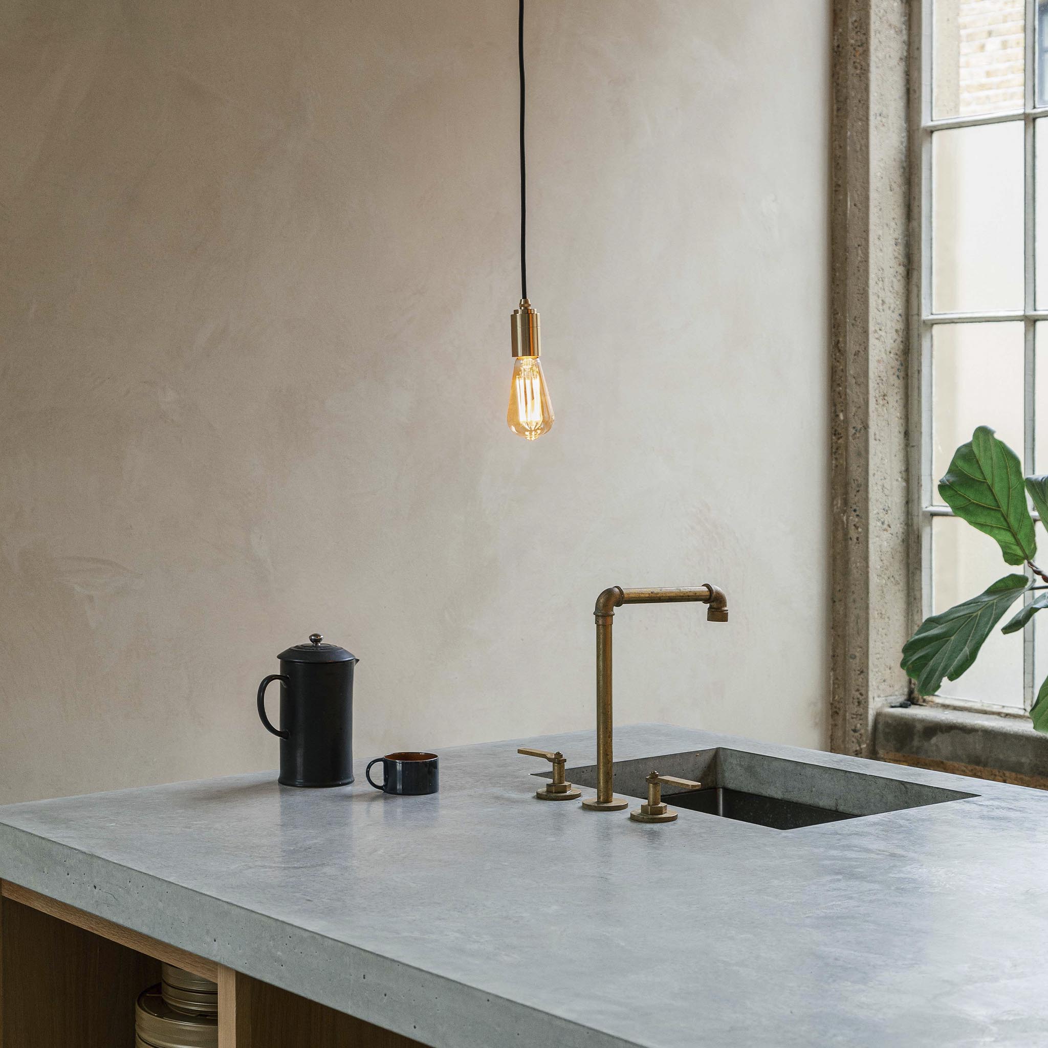 Tala Squirrel Cage Plug-In Pendant in Graphite — lifestyle photo in a living space