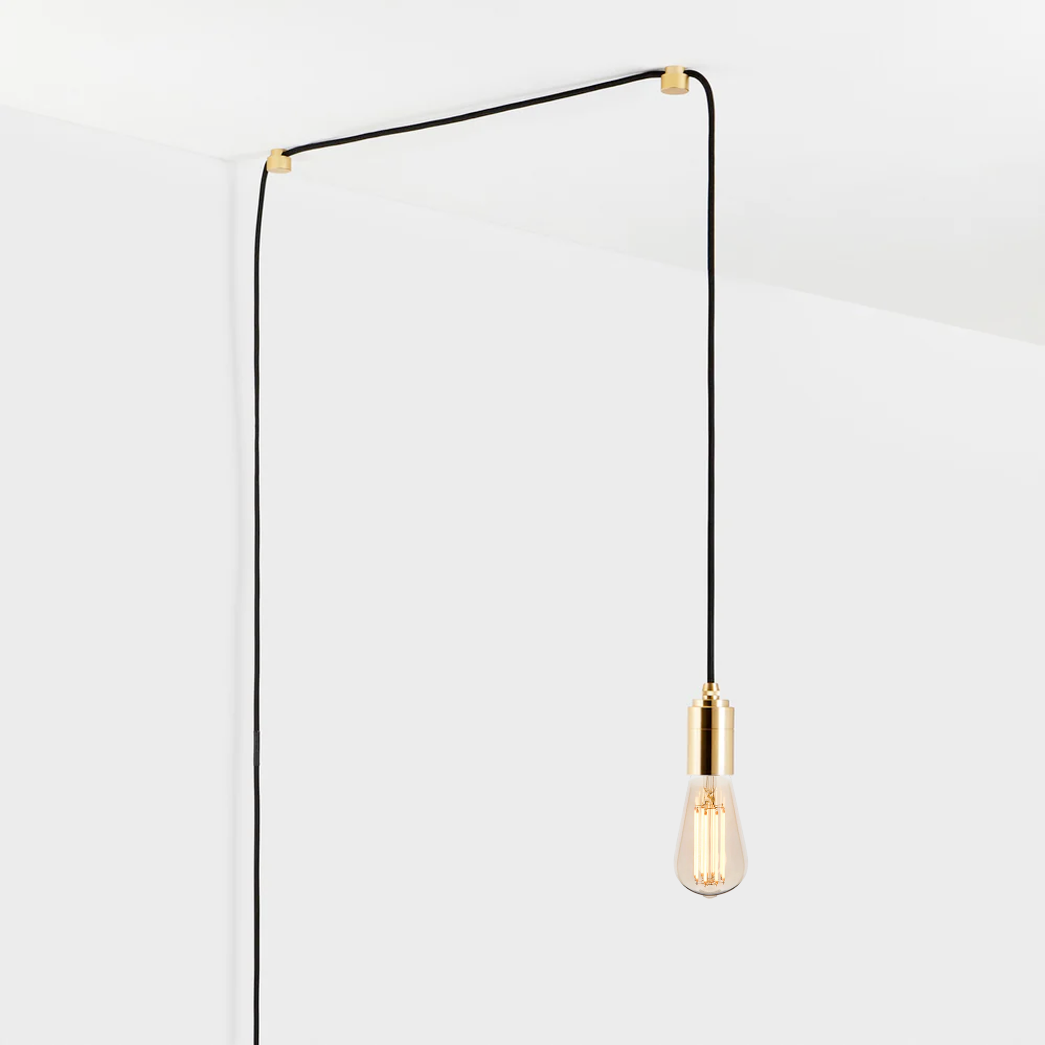 Tala Squirrel Cage Plug-In Pendant in Brass — studio product shot