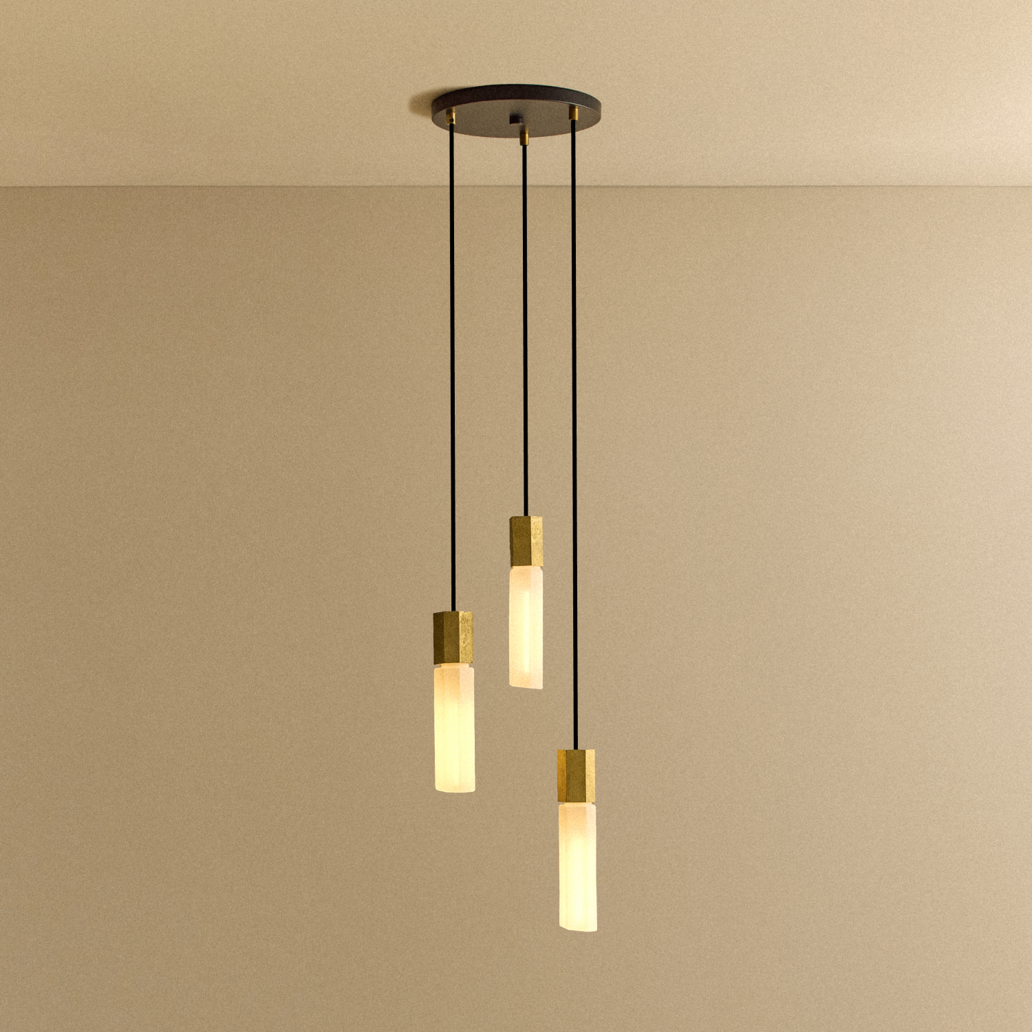 Basalt Triple Pendant by Tala in cast Brass, front view of the three-light fixture