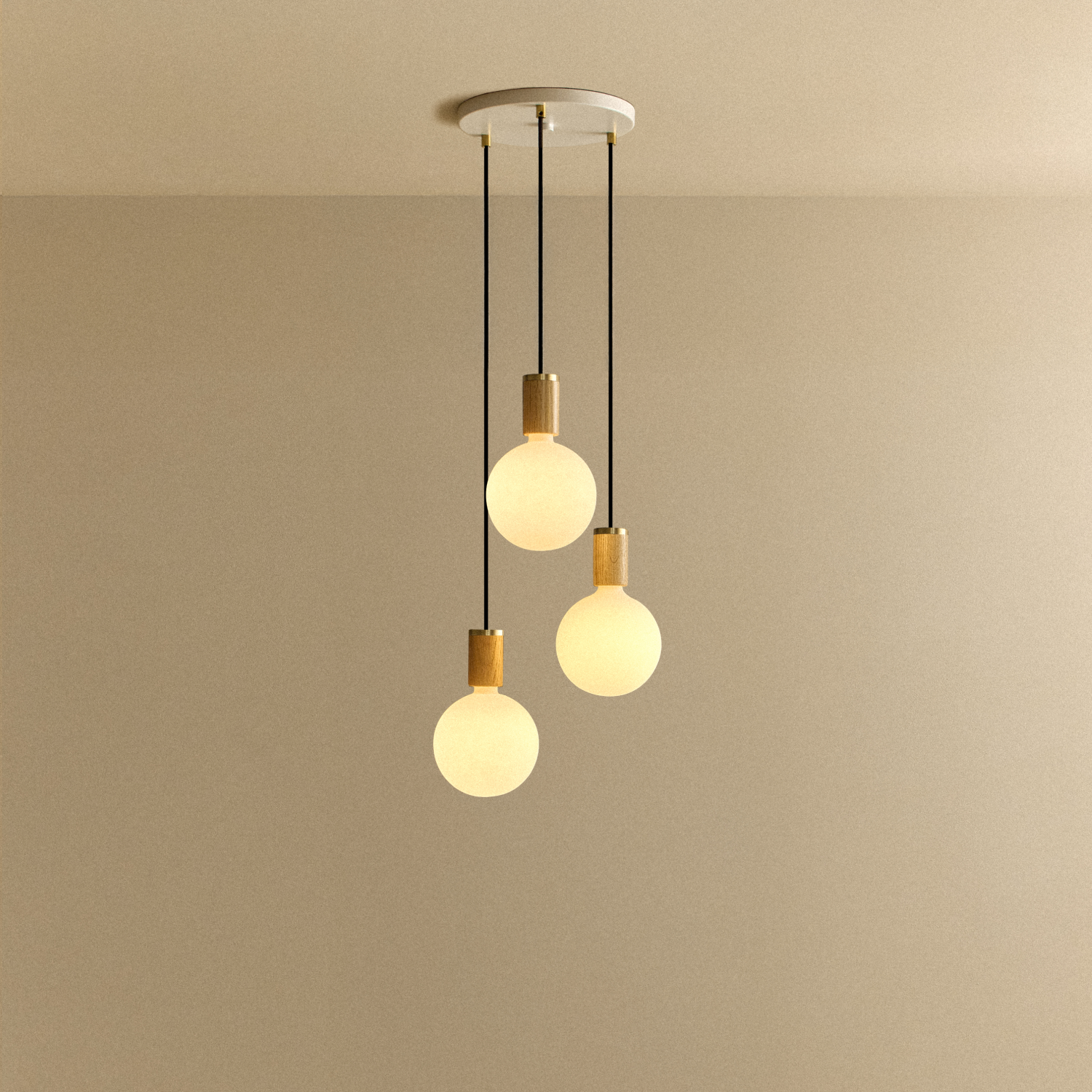 Tala Triple Pendant in Oak with Sphere IV bulbs — oak and brass pendant light