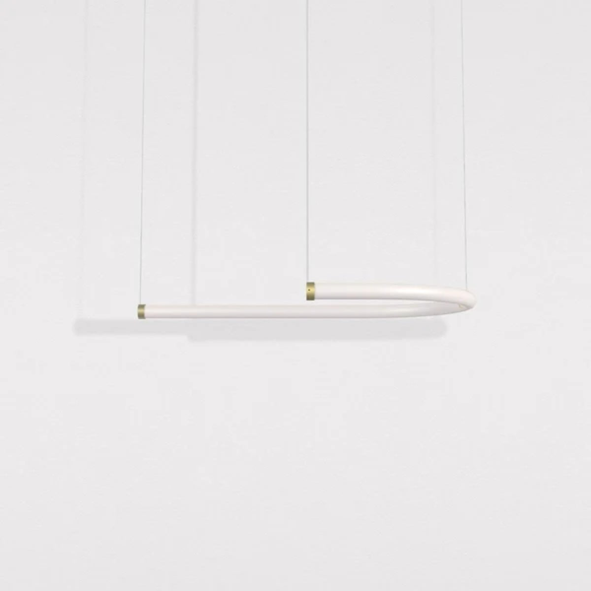 Petite Friture Unseen J pendant light hung horizontally, side view