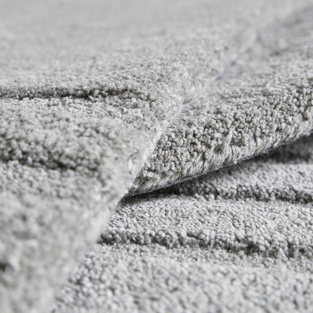 WOUD Kyoto Runner in hand-tufted wool styled in a living room