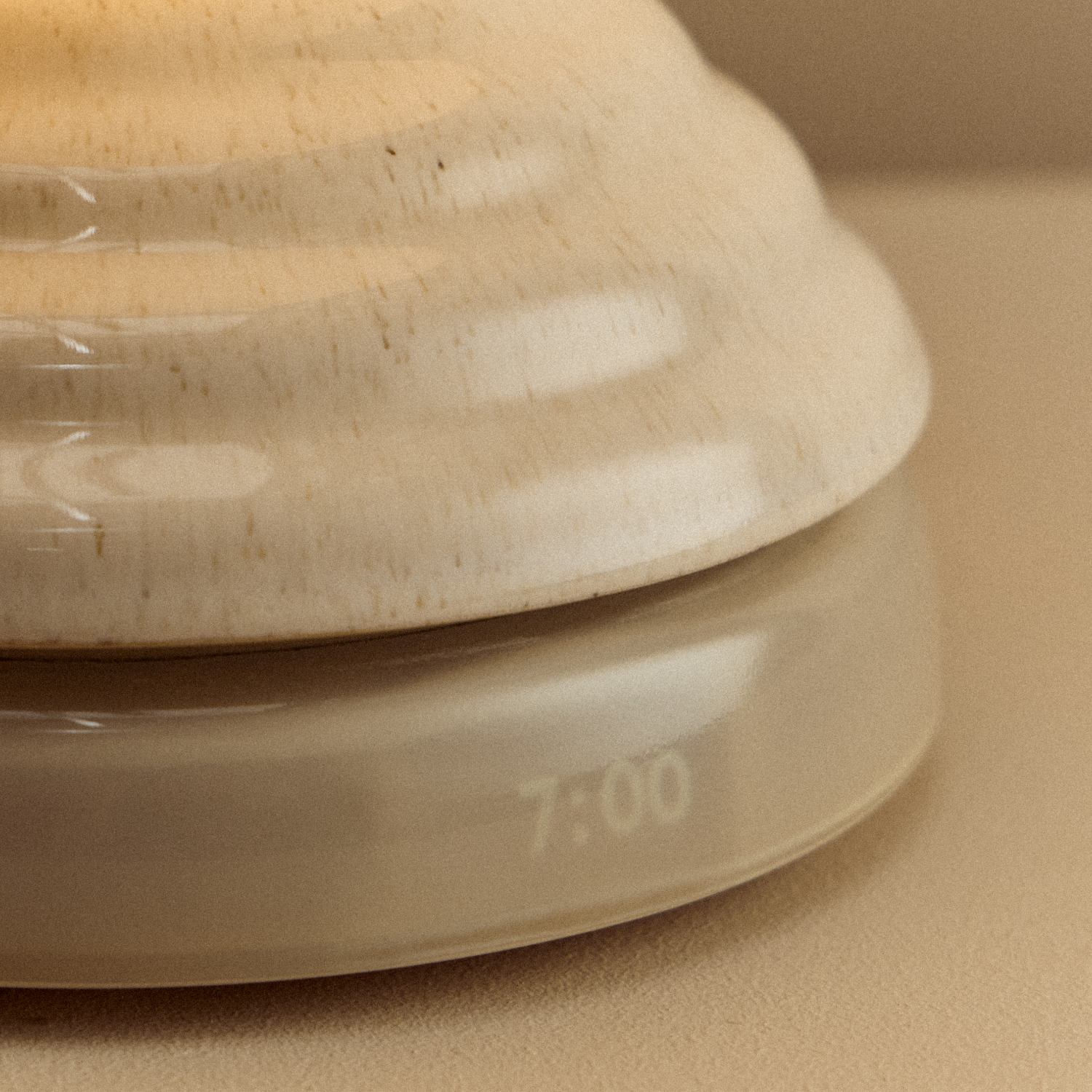 Wake Sleep Light in Pebble White by Tala — table lamp, top-down view
