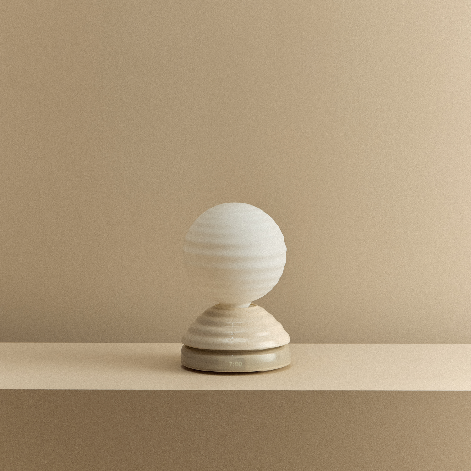 Wake Sleep Light in Pebble White by Tala — table lamp, in-use view