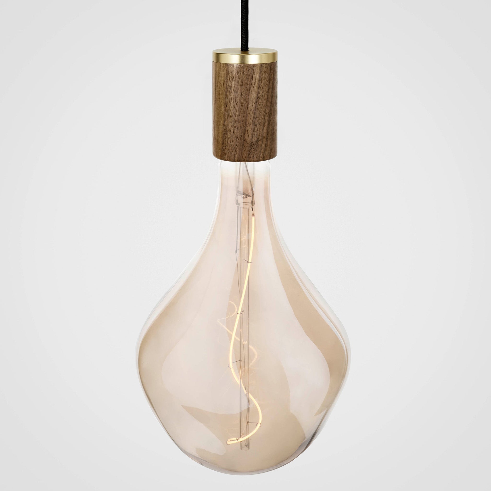 Voronoi II bulb in Walnut pendant, lit, grey background