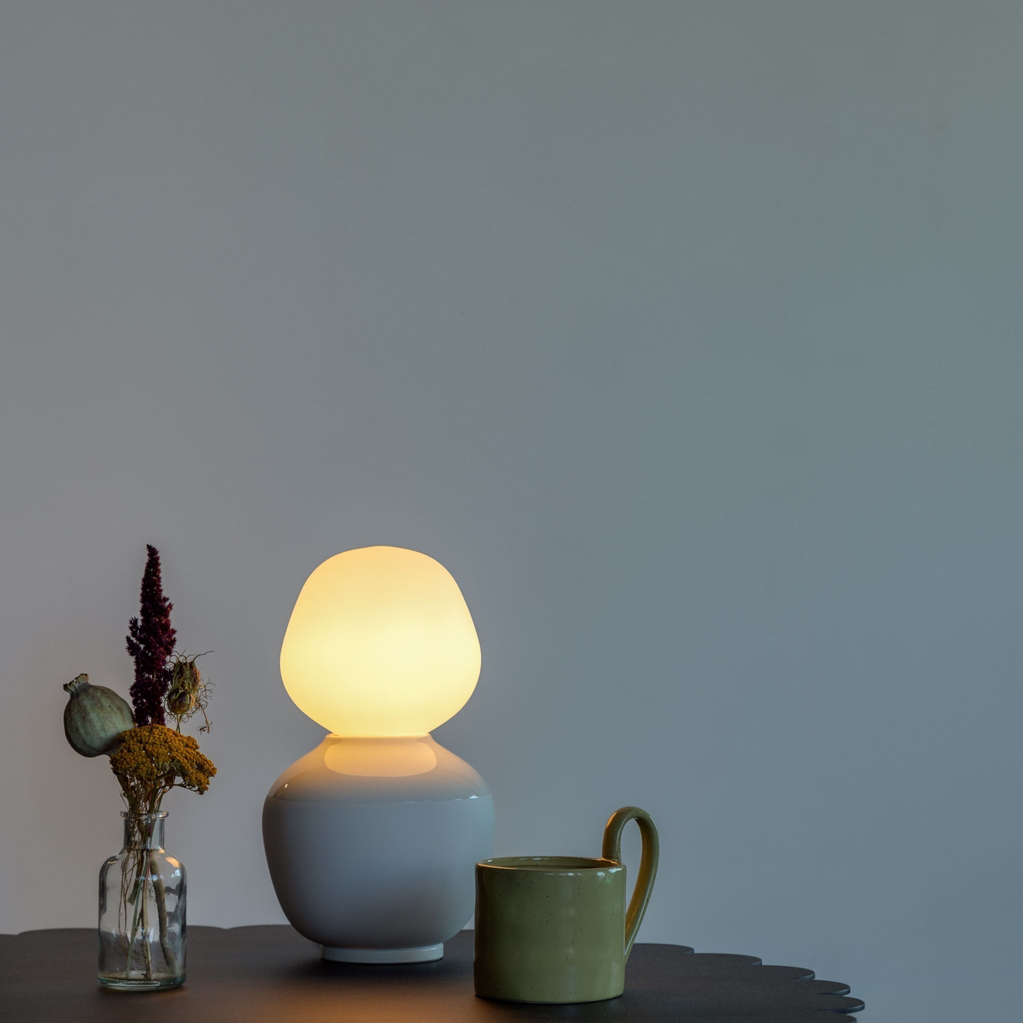 Tala Reflection Enno Table Lamp, close-up in a living room
