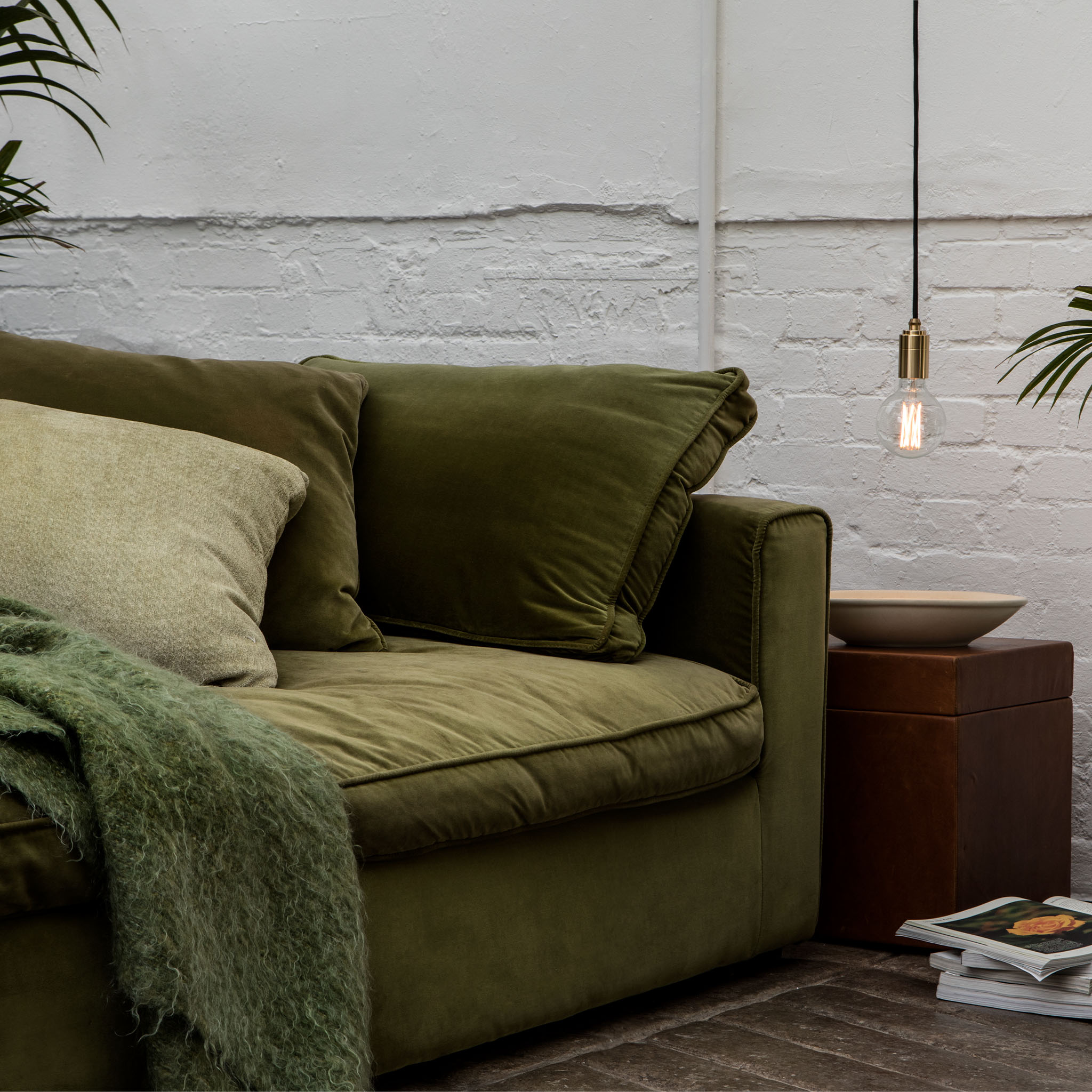 Elva Pendant Light in Graphite, Tinted, shown in a living room setting