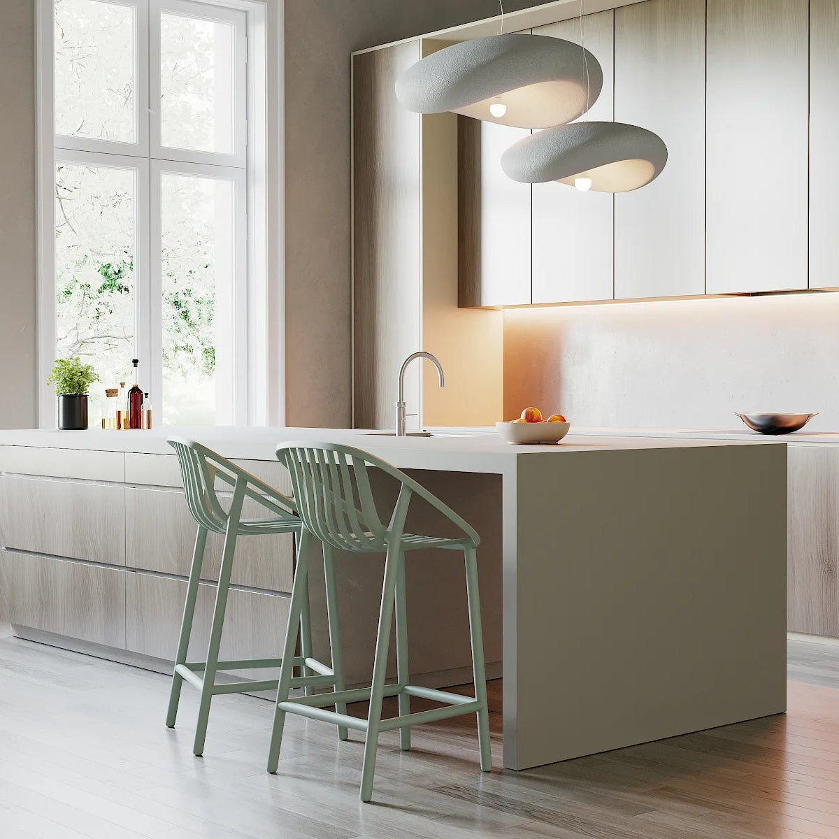 Resol Bini Bar Stools at a kitchen island, styled in an interior setting, polypropylene with fiberglass