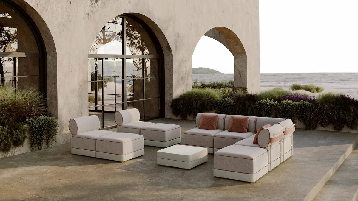 Resol Brisa Decorative Cushions in Amber on Brisa modular sofas, styled on a terrace, solution-dyed acrylic