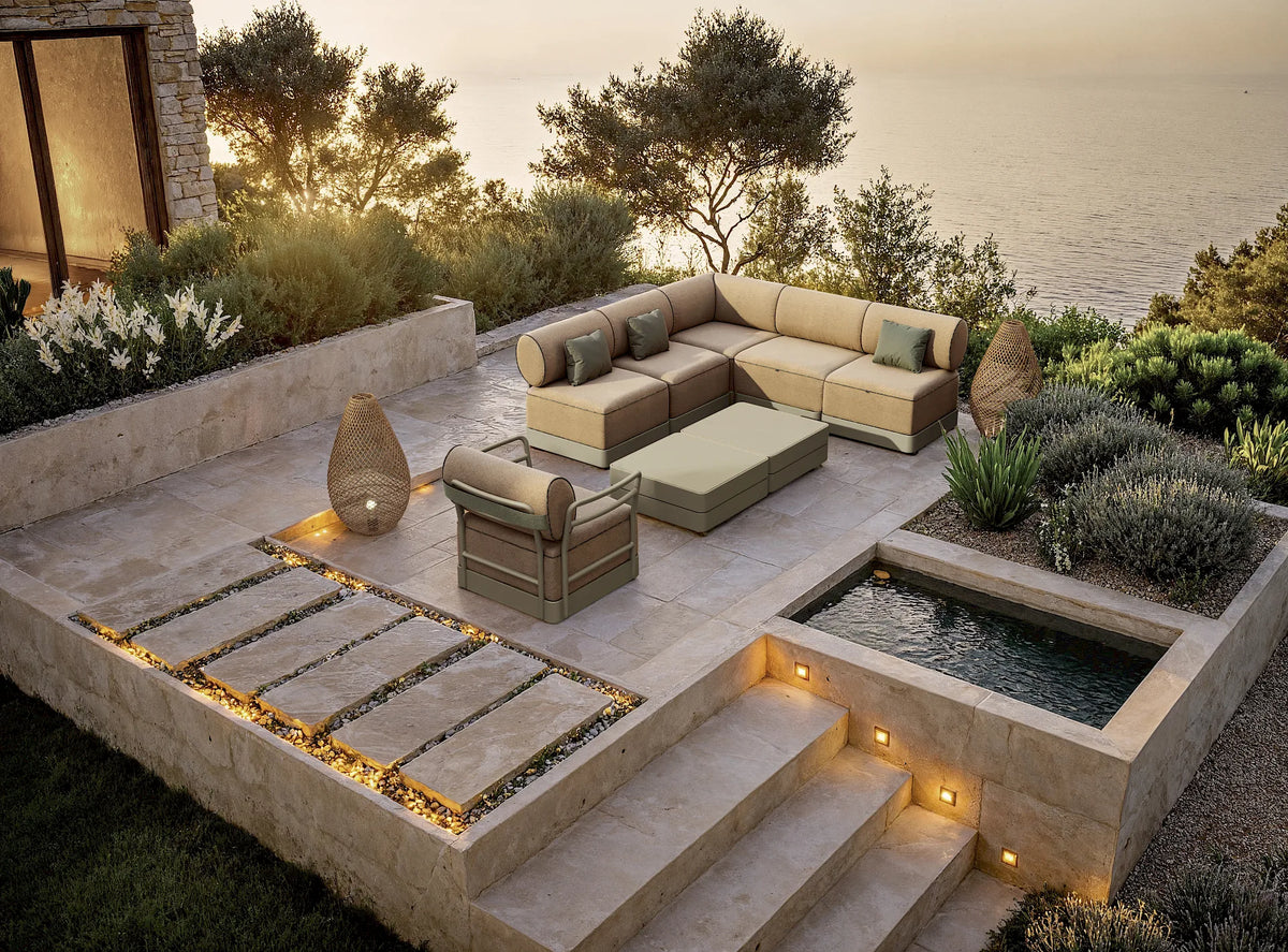 Resol Brisa modular sofas with decorative cushions, styled on a terrace at dusk, solution-dyed acrylic