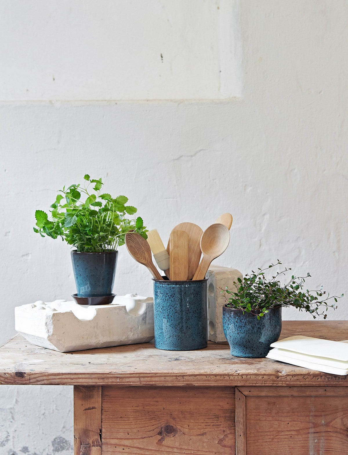Knabstrup flowerpots in several glazes, styled in an interior setting, glazed terracotta