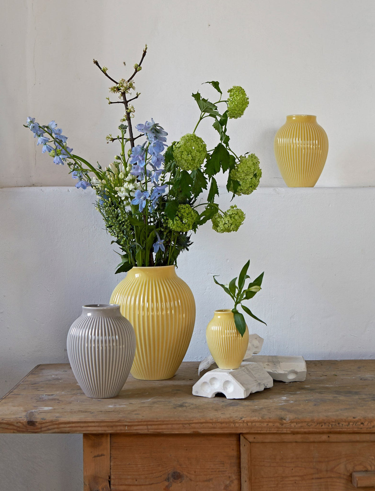 Knabstrup ripple vases in several glazes, styled in an interior setting, glazed earthenware
