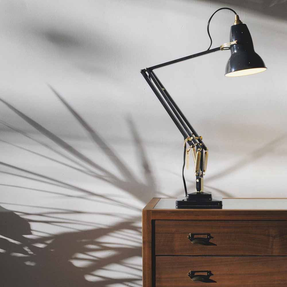 Anglepoise Original 1227 Brass Desk Lamp in Elephant Grey, styled in an interior setting, aluminum and brass