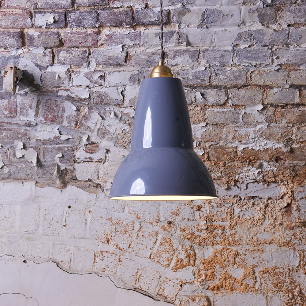 Anglepoise Original 1227 Maxi pendant in Dusty Blue against a weathered brick wall