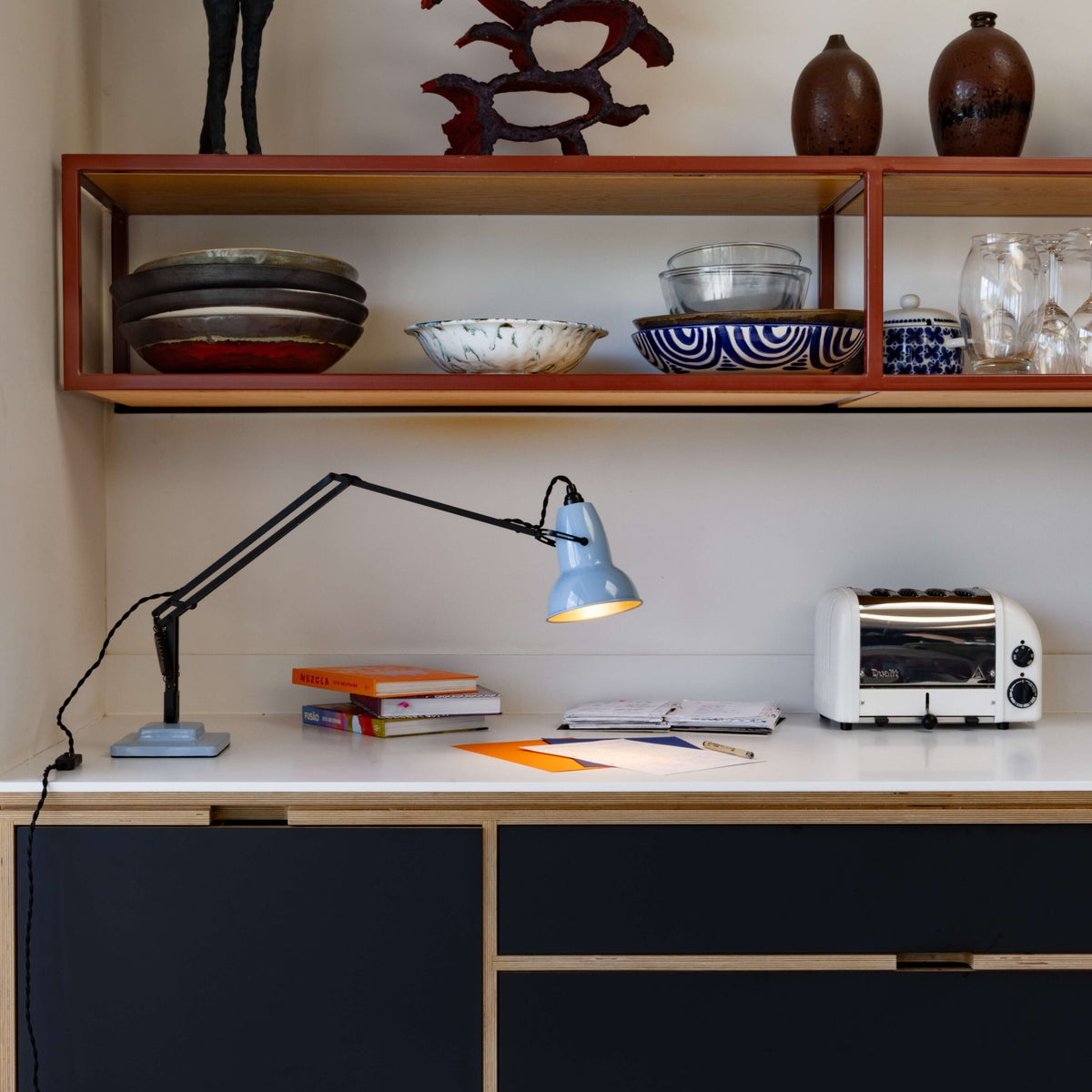 Anglepoise Original 1227 Desk Lamp in Opal Blue and Satin Black, styled in an interior setting, painted steel